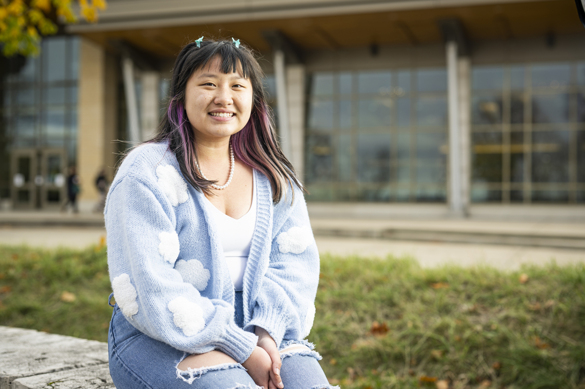Undergraduate Jasmine Phung is pictured near DeJope Residence Hall.