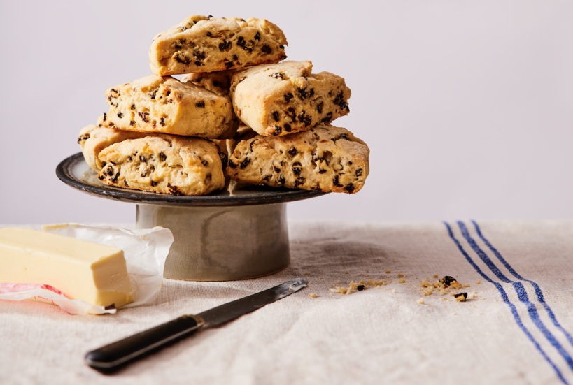 Some scones sit on top of a dish