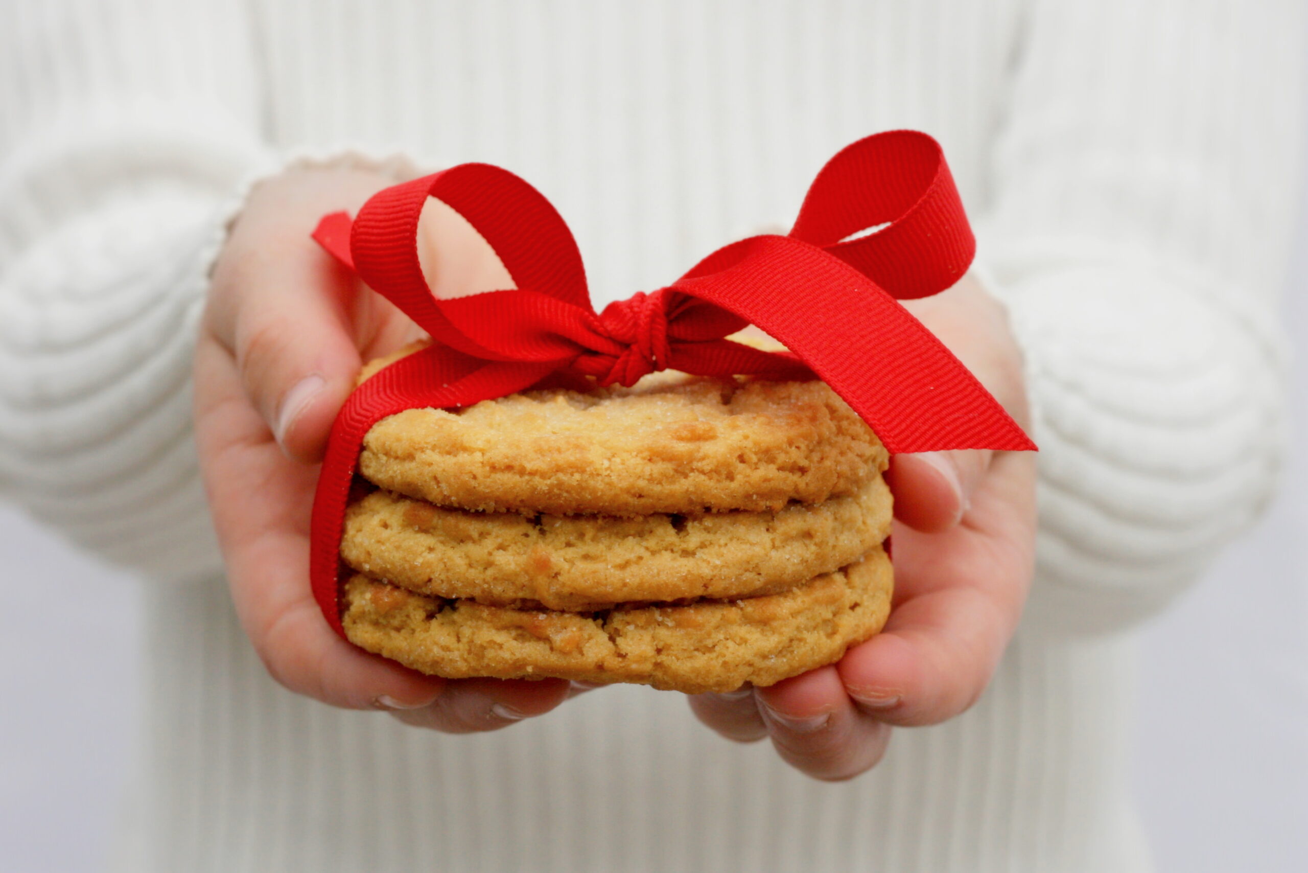 Cookies wrapped in a red bow