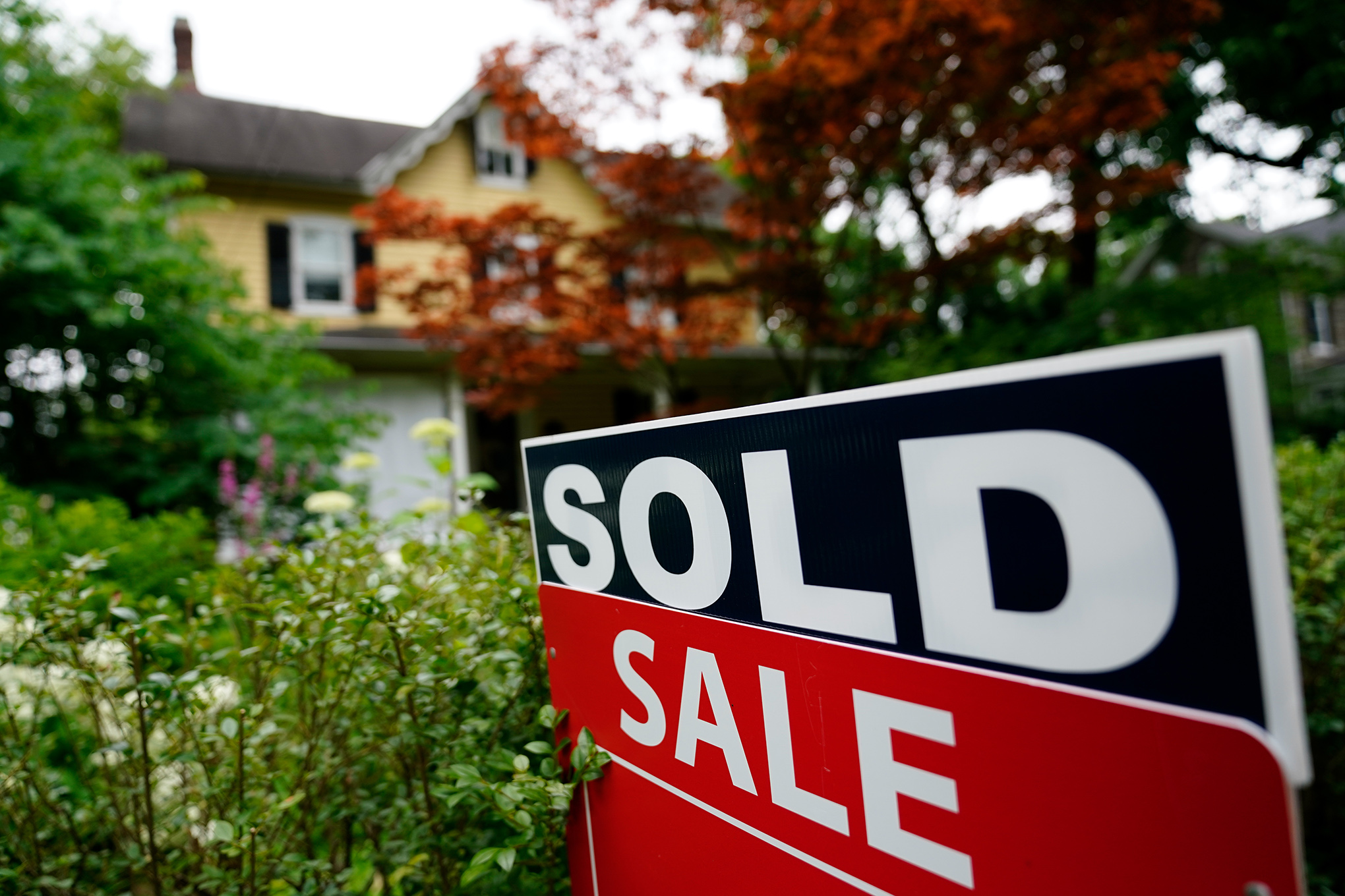 Why do median home prices in 3 Wisconsin counties top $400K?
