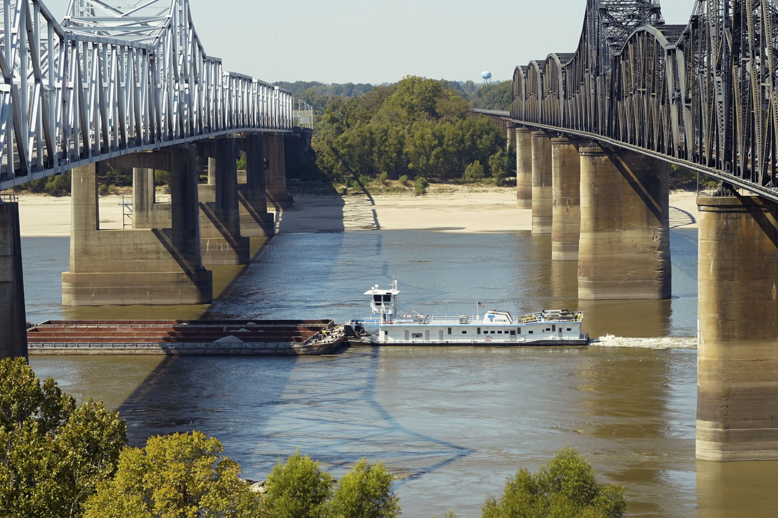 A boat navigates the Mississippi River