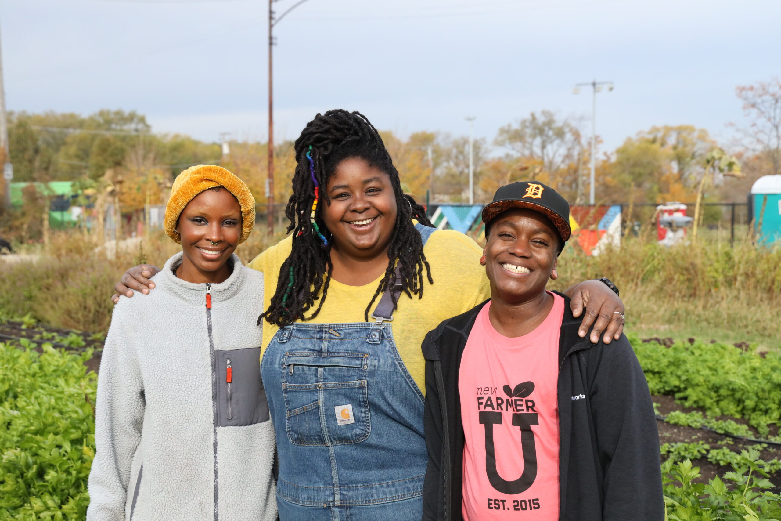 Fresher Together finance specialist Shreya Long, founder Chef Fresh Roberson and farm manager Danie Roberson stand together