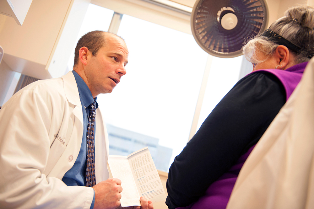 A Marshfield Clinic Health System dermatologist counsels a patient in Marshfield.