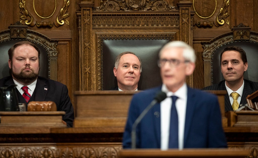 Assembly Speaker Robin Vos listening to Gov. Tony Evers address