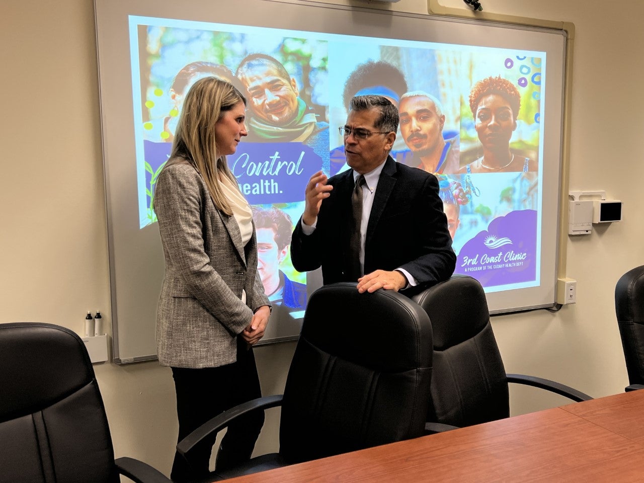 xavier becerra speaks with a doctor