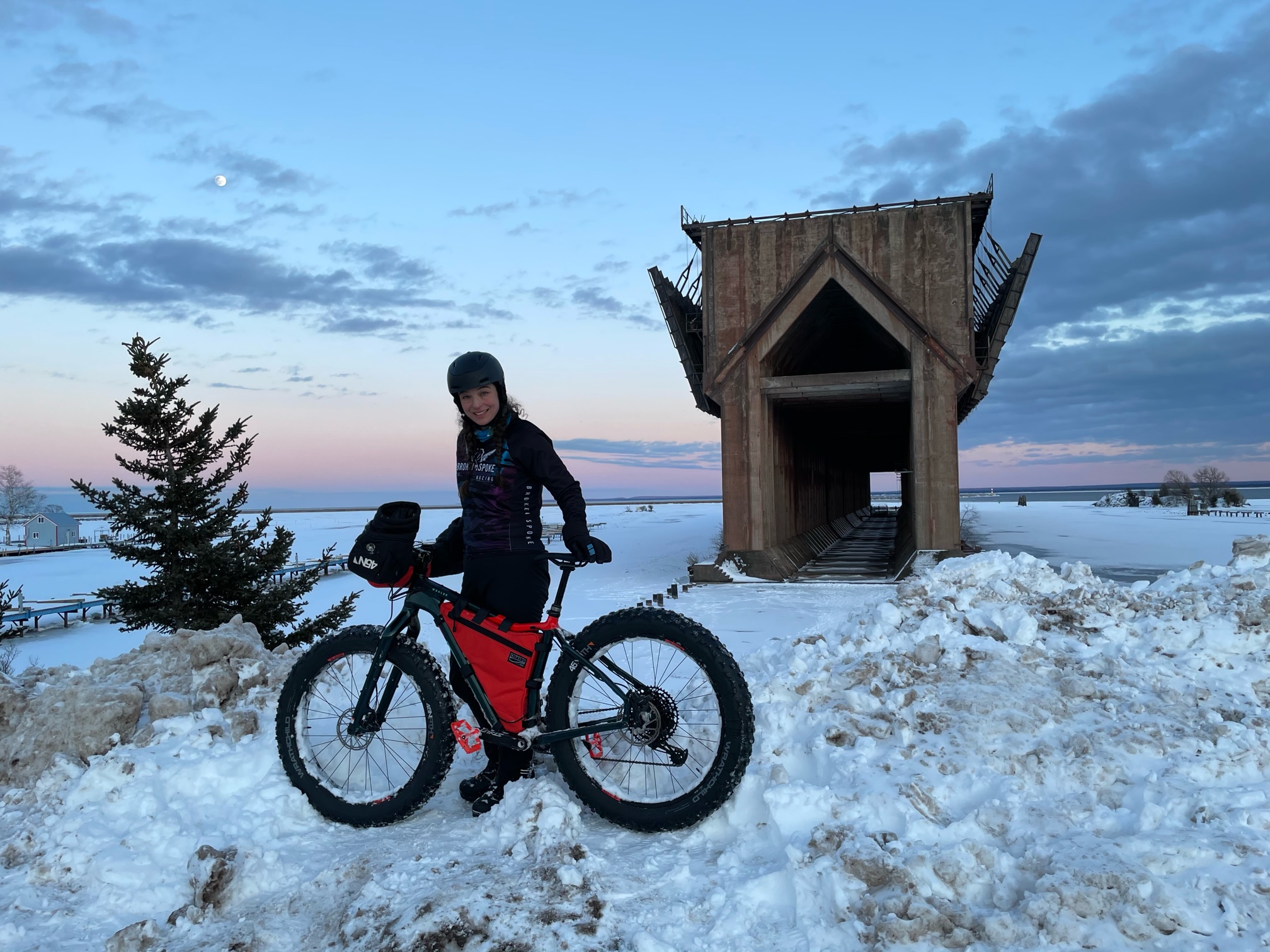 Laura Hrubes of Viroqua stops on her fat bike in front of the old ore dock in Marquette, Mich.