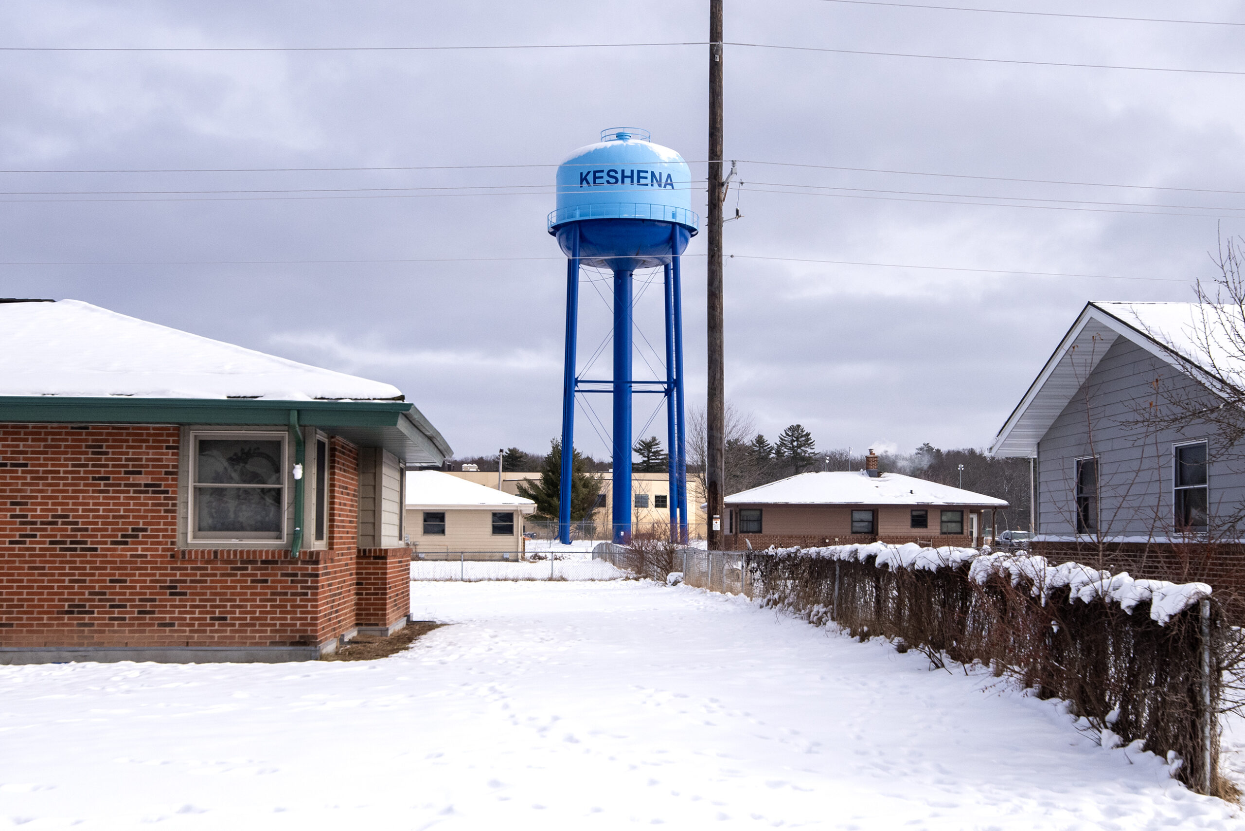 A blue water tower with 