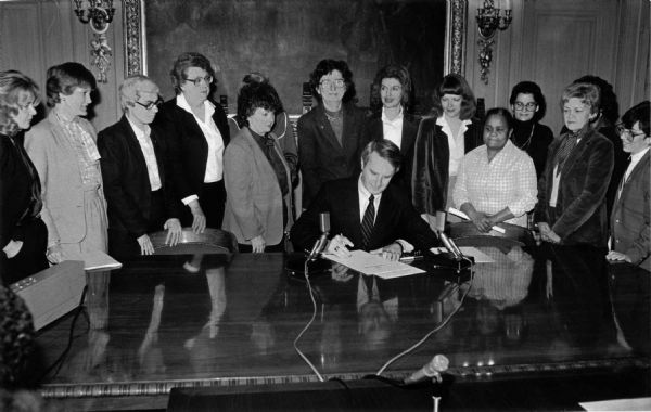 Gov. Tony Earl signing an executive order creating the Wisconsin Women’s Council.