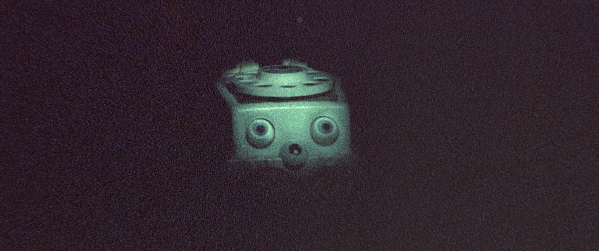 Fisher-Price Chatter Telephone in dark room