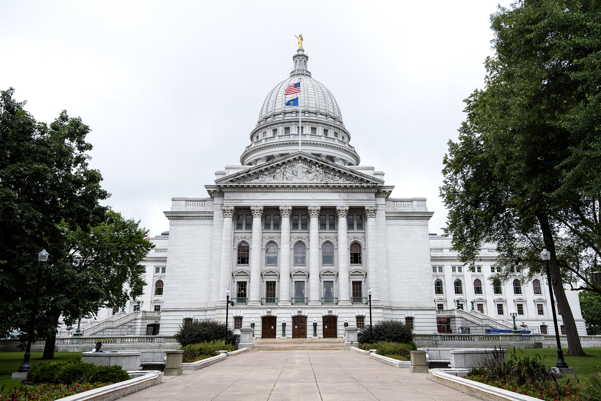 the Wisconsin State Capitol against a gray sky