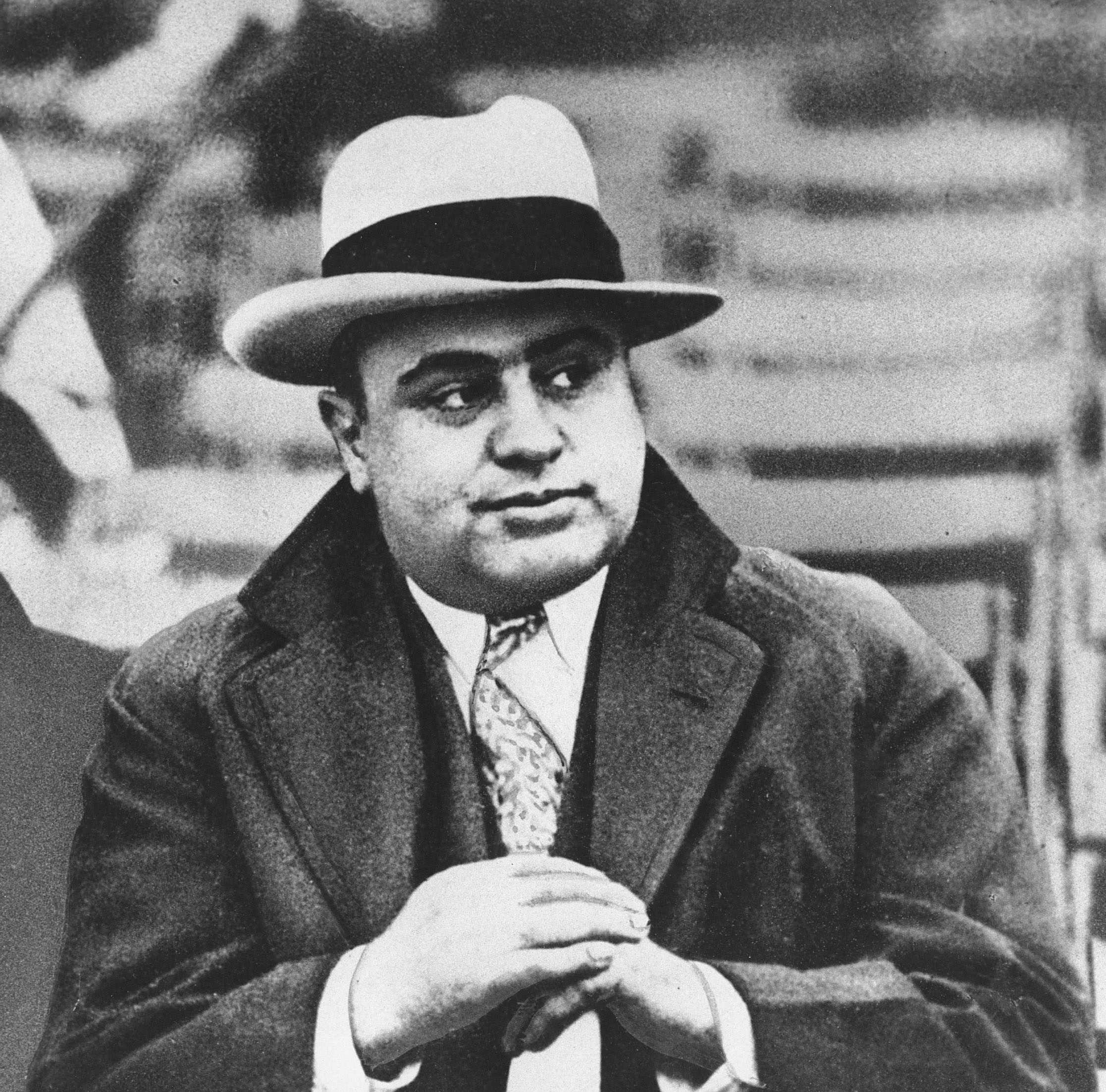 Al Capone sitting down