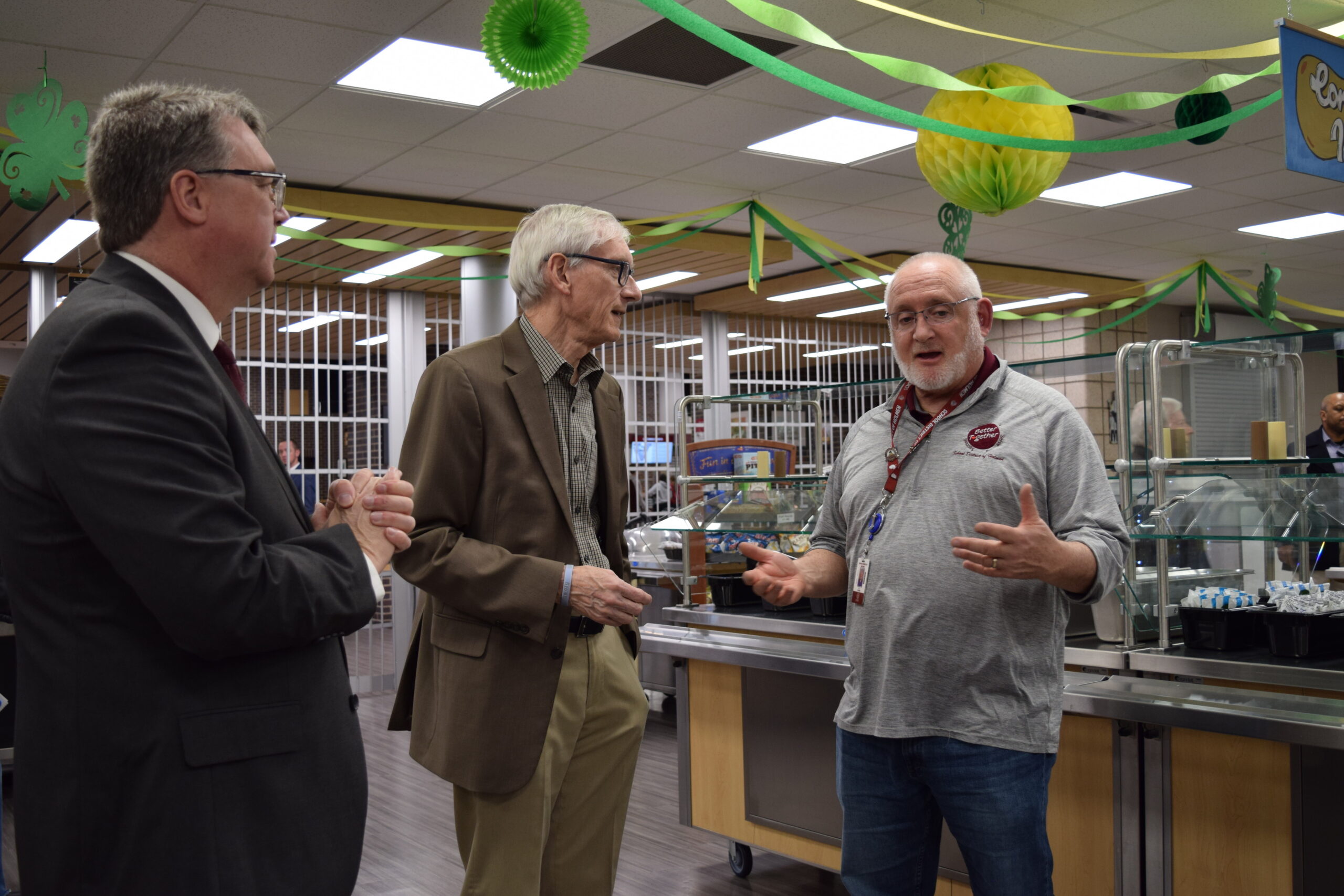 Evers talks with Holmen Schools' nutrition services director in the cafeteria