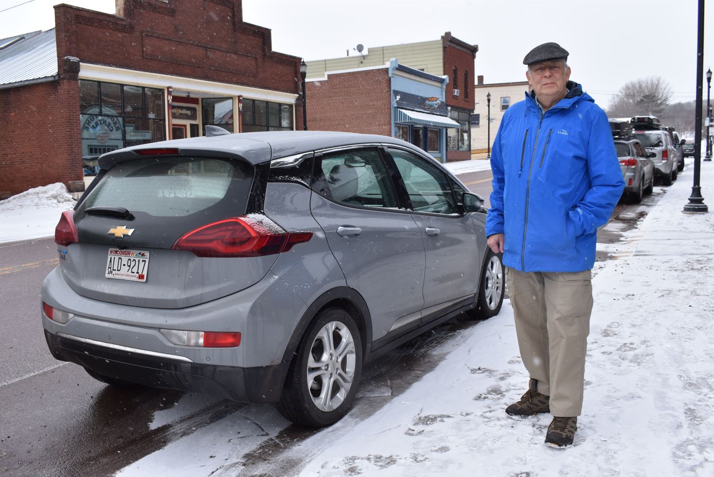 Bill Bussey next to his 2021 Chevy Bolt