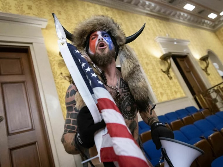 U.S. Capitol rioter the ‘QAnon Shaman’ is released early from federal prison