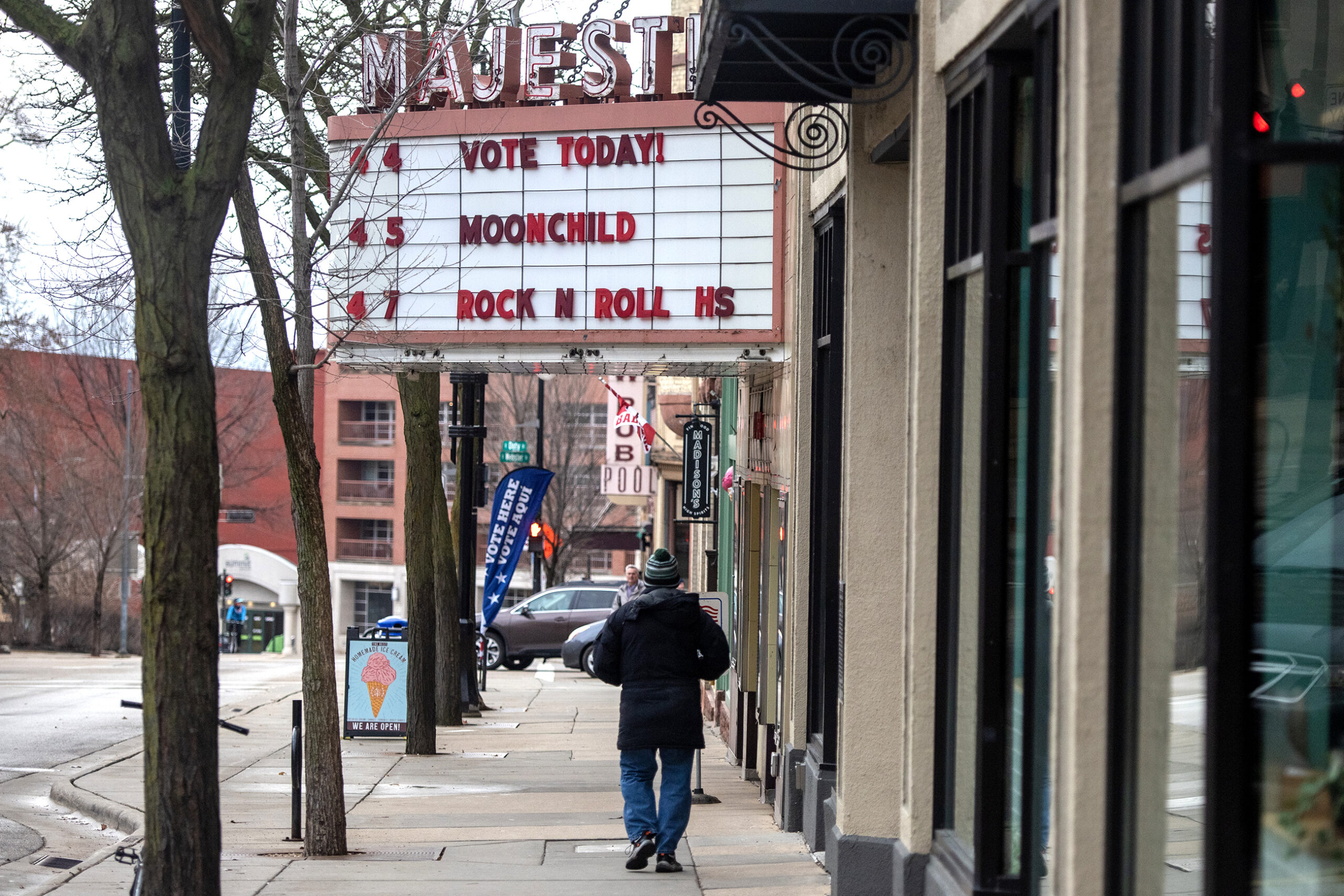 The marquee outside of a theater says "VOTE TODAY!" along with other shows.