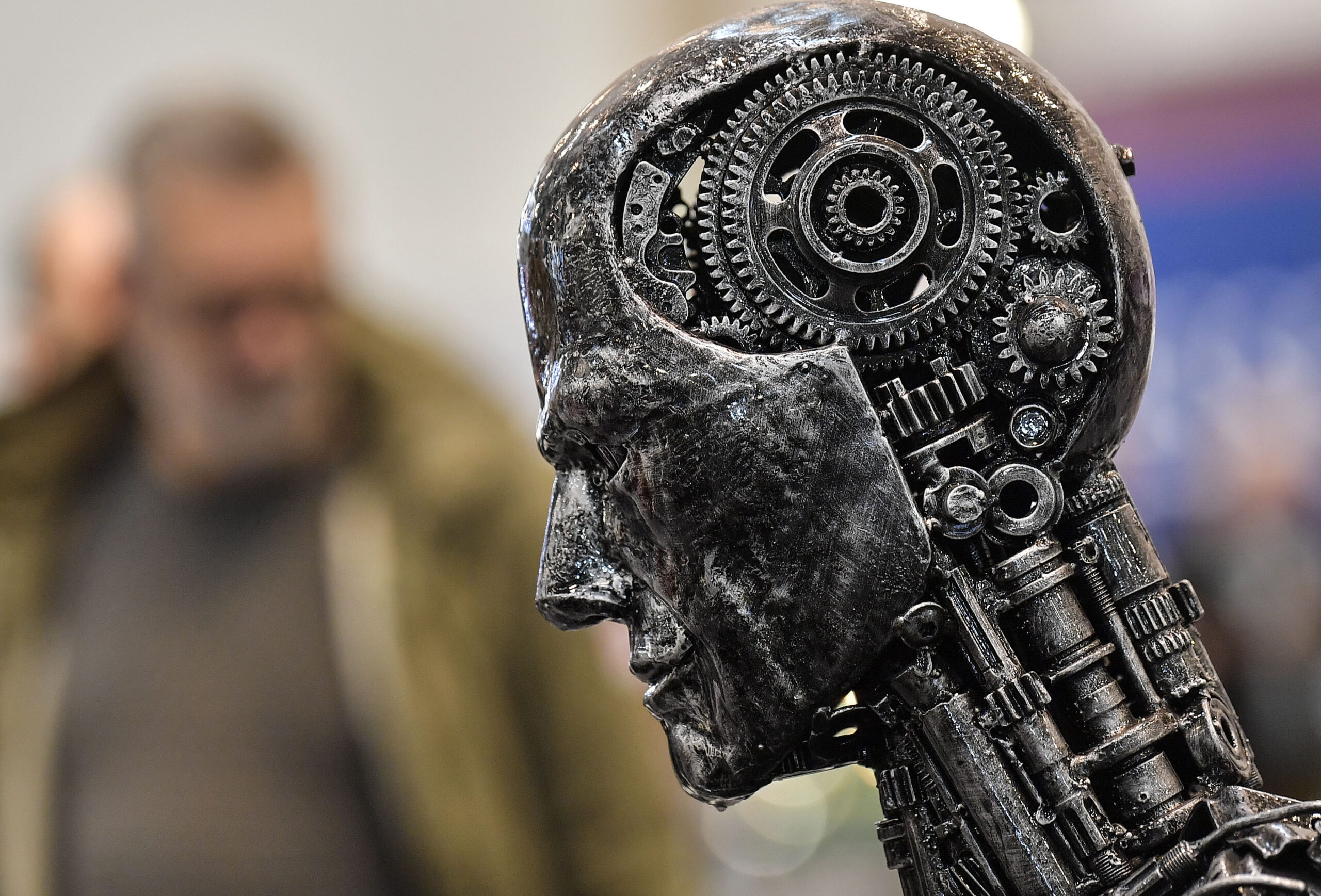 In this Nov. 29, 2019, file photo, a metal head made of motor parts symbolizes artificial intelligence, or AI, at the Essen Motor Show for tuning and motorsports in Essen, Germany.