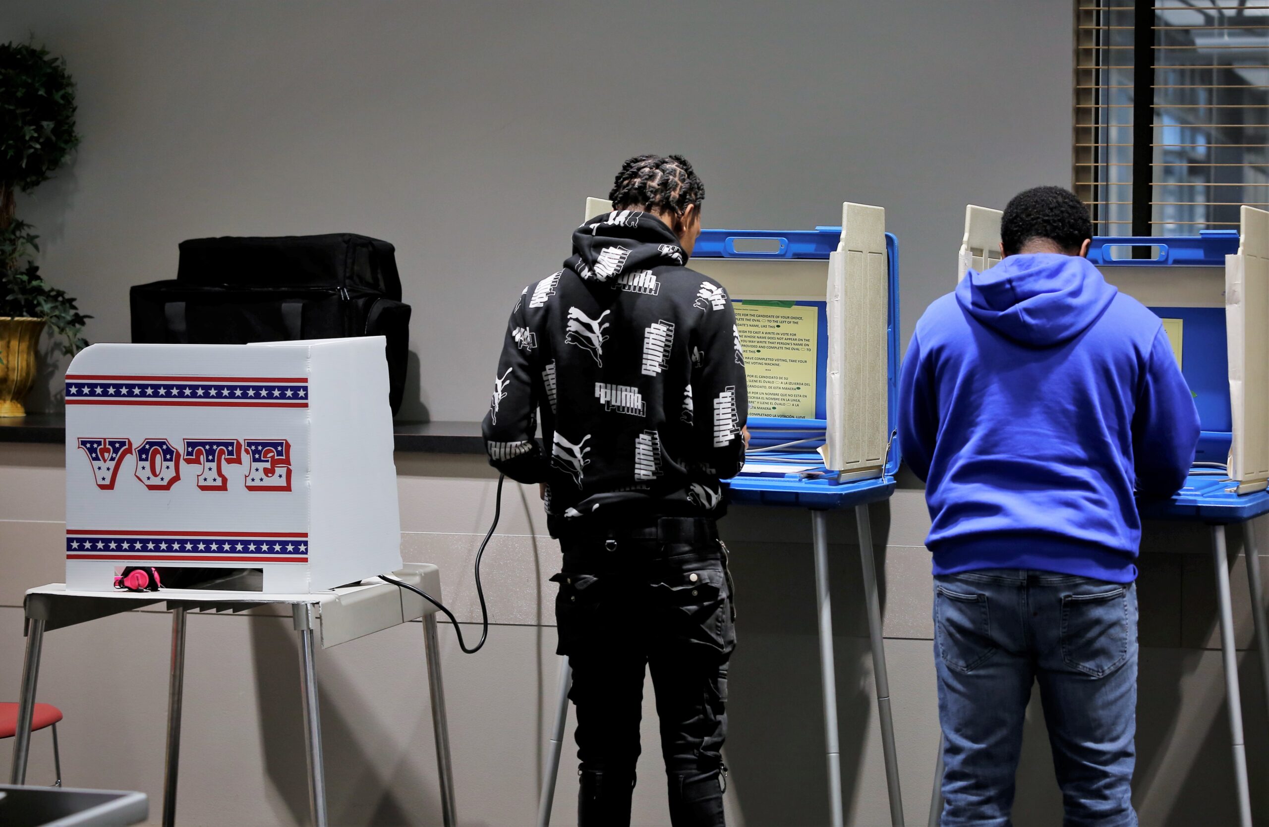 Christopher, left, and Brandon LaSalle voted together on April 4, 2023 at the Washington Park Library in Milwaukee