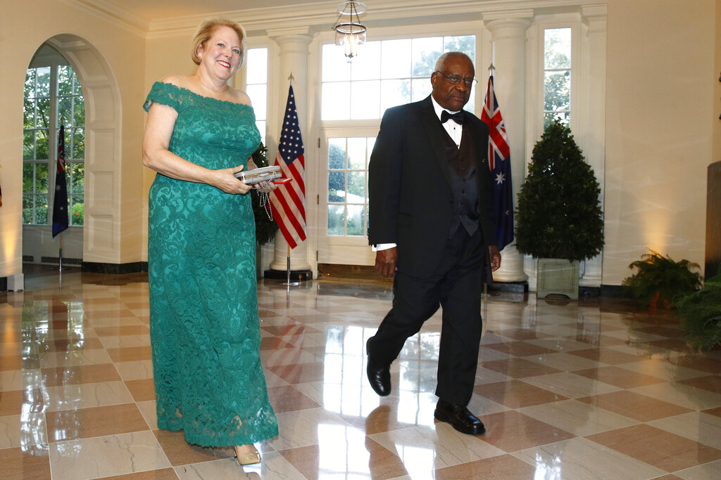 Supreme Court Associate Justice Clarence Thomas, right, and wife Virginia "Ginni" Thomas arrive for a State Dinner with Australian Prime Minister Scott Morrison and President Donald Trump at the White House in Washington, on Sept. 20, 2019.
