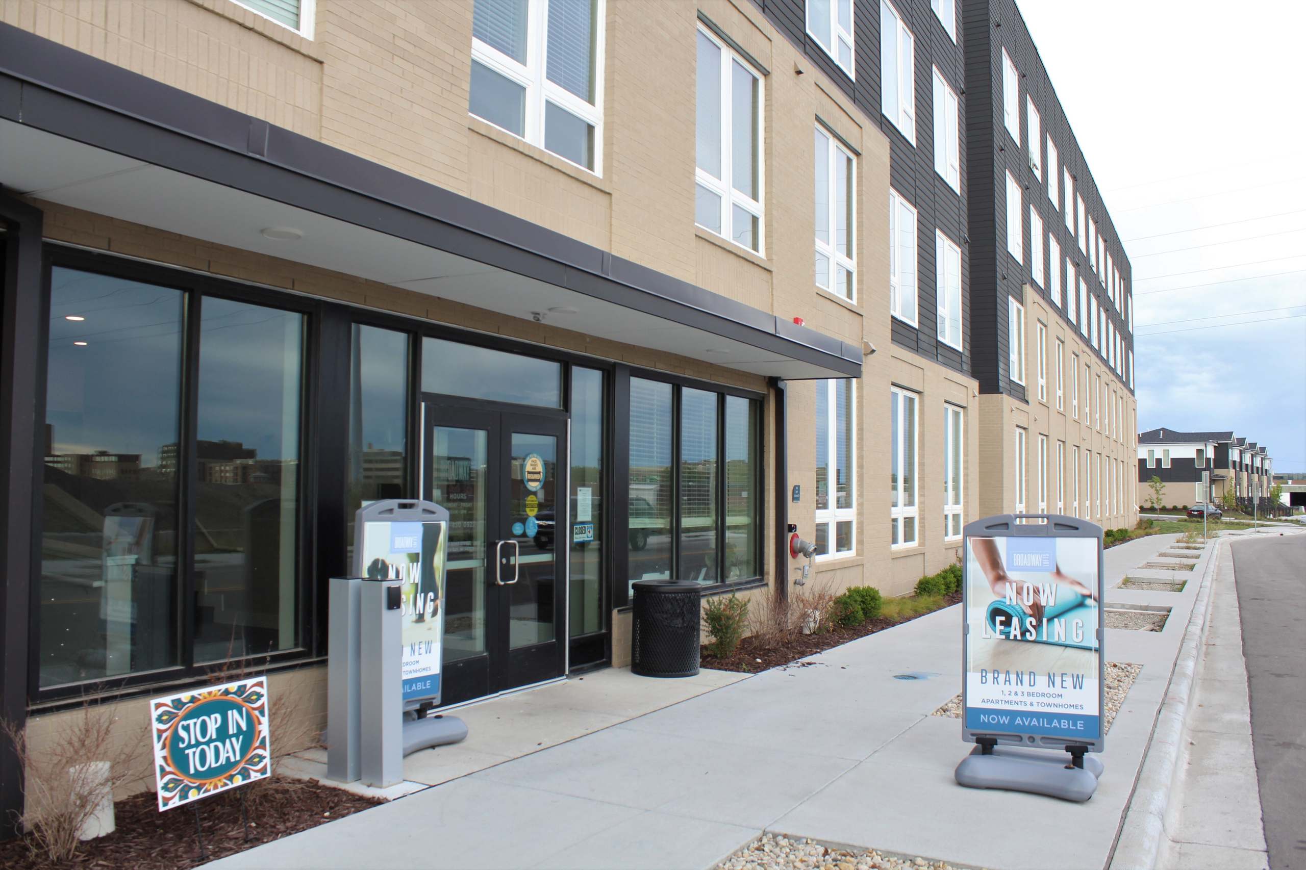 Signs advertise available apartments at Broadway Lofts in Green Bay