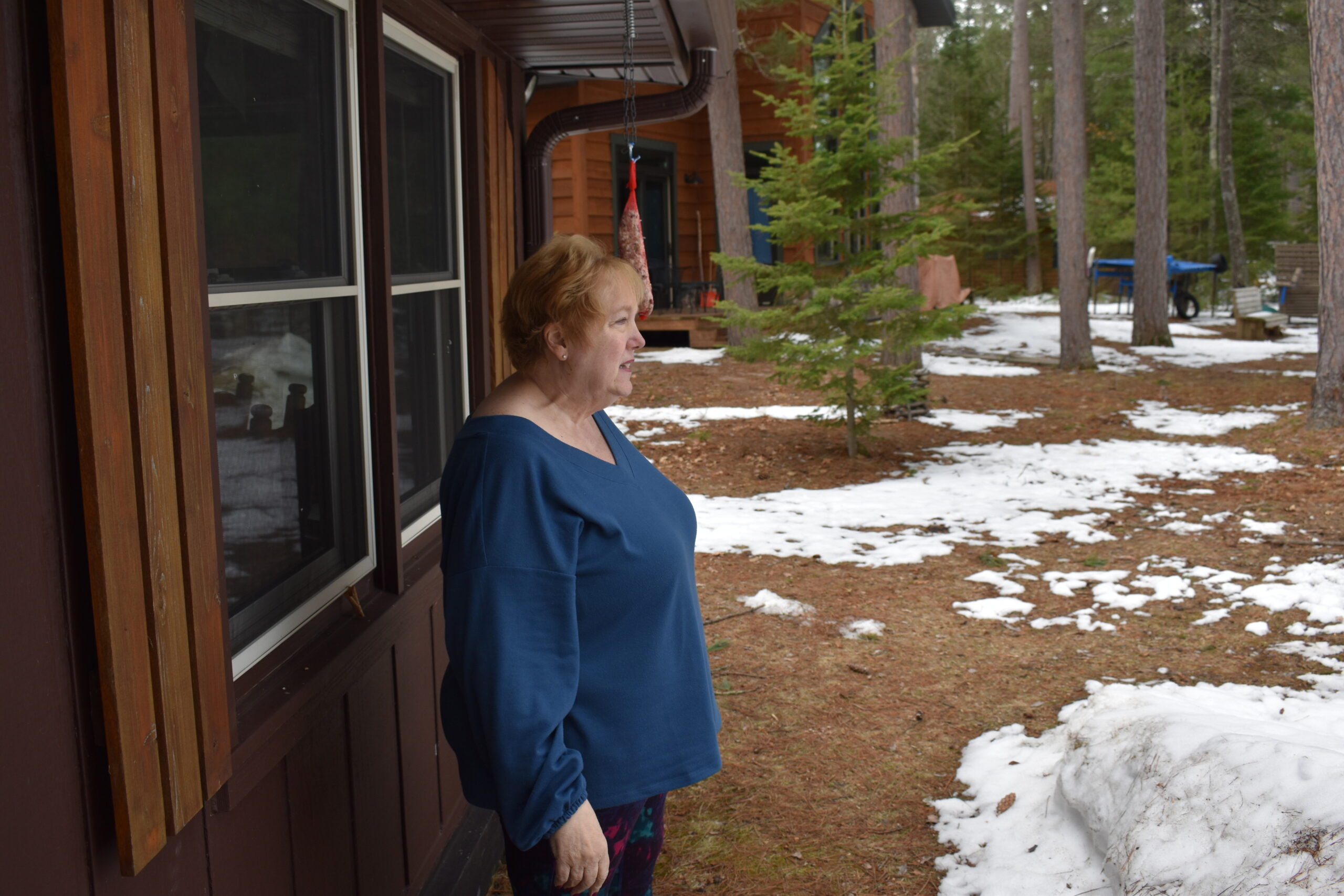 Colleen Rooney faces Lost Lake in the backyard of her new home