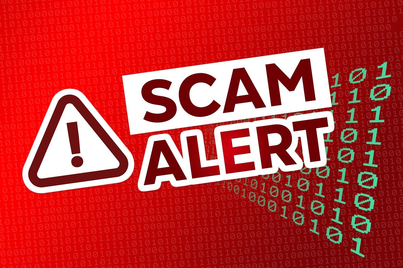 Graphic that says scam alert