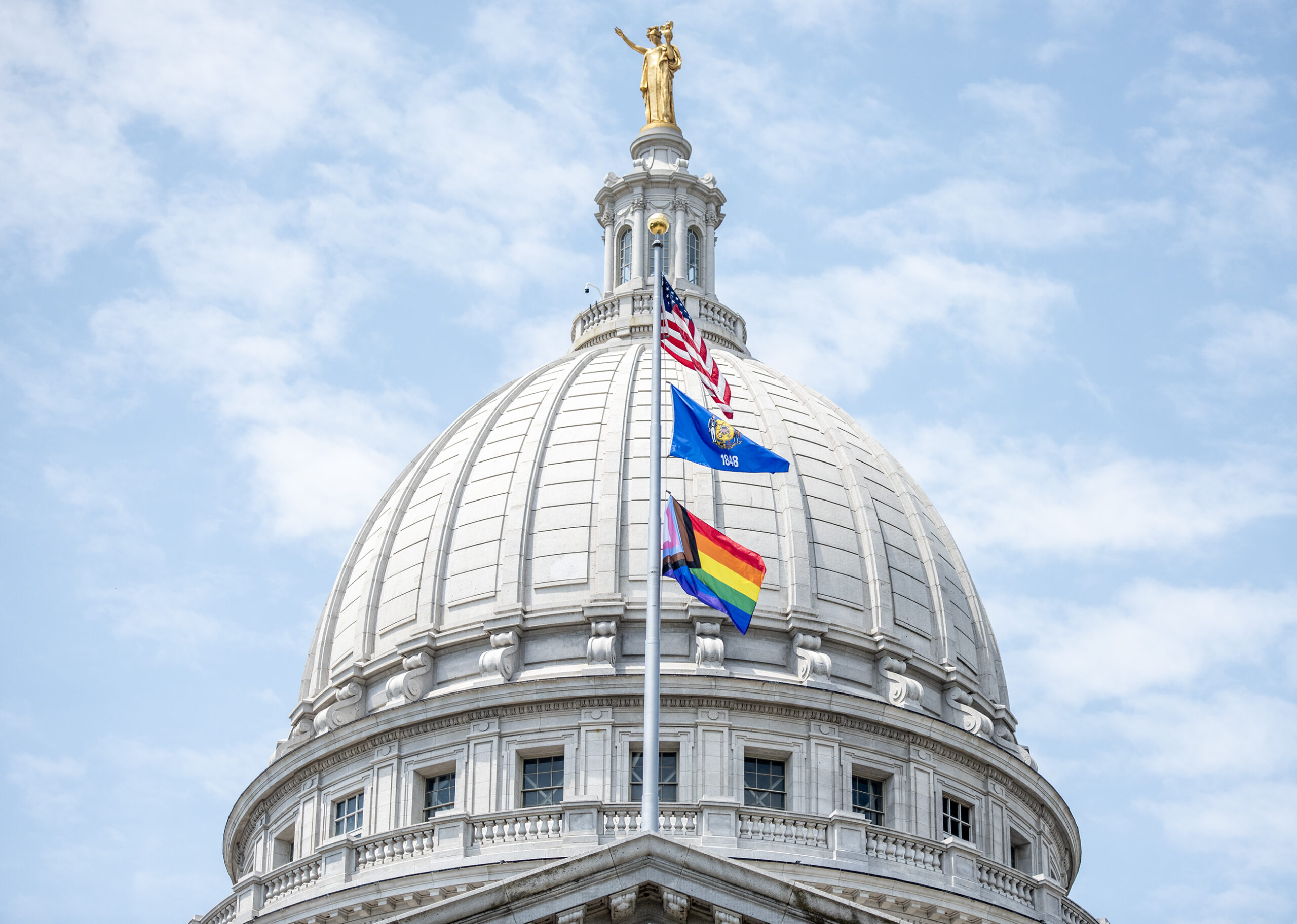 Gov. Tony Evers marks LGBTQ+ Pride Month with rainbow flag raising at Wisconsin State Capitol