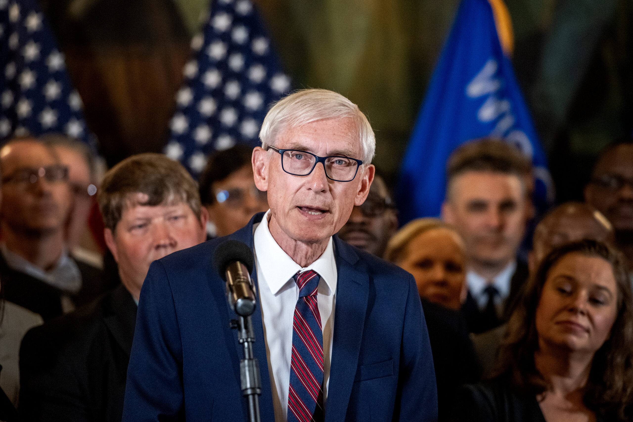 Gov. Tony Evers looks ahead as he speaks.