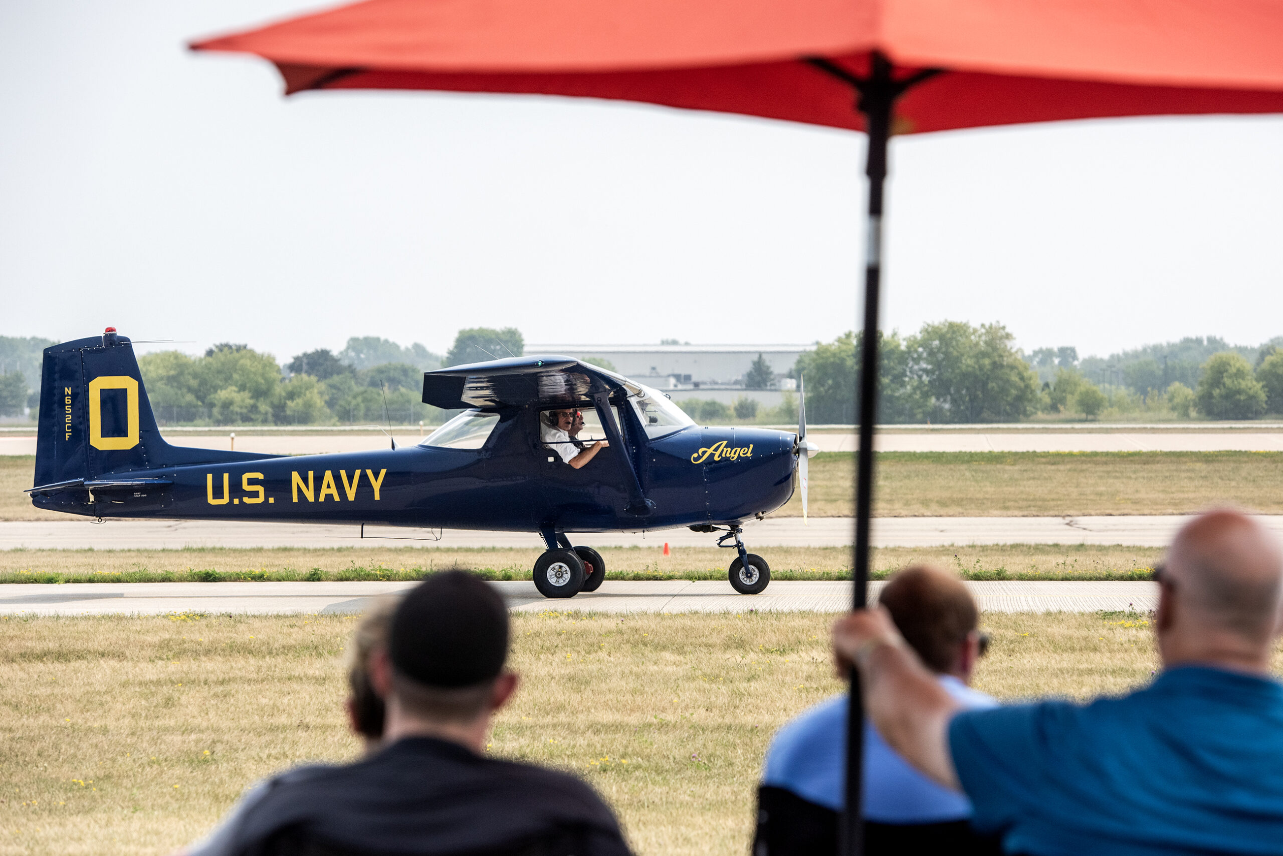 A navy blue plane with 