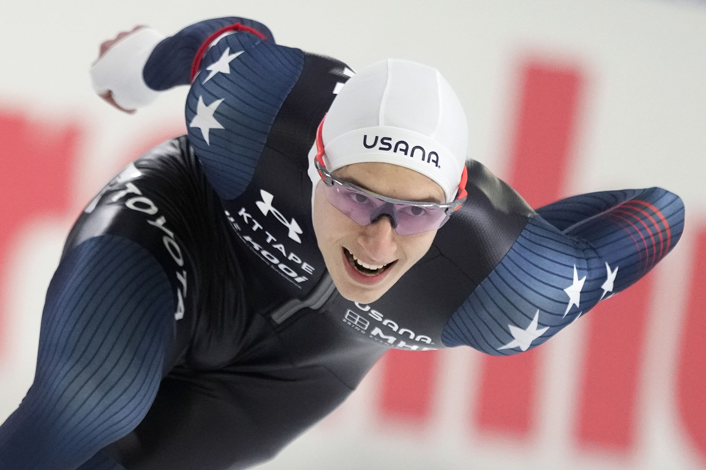 A speedskater smiles during a competition in the Netherlands