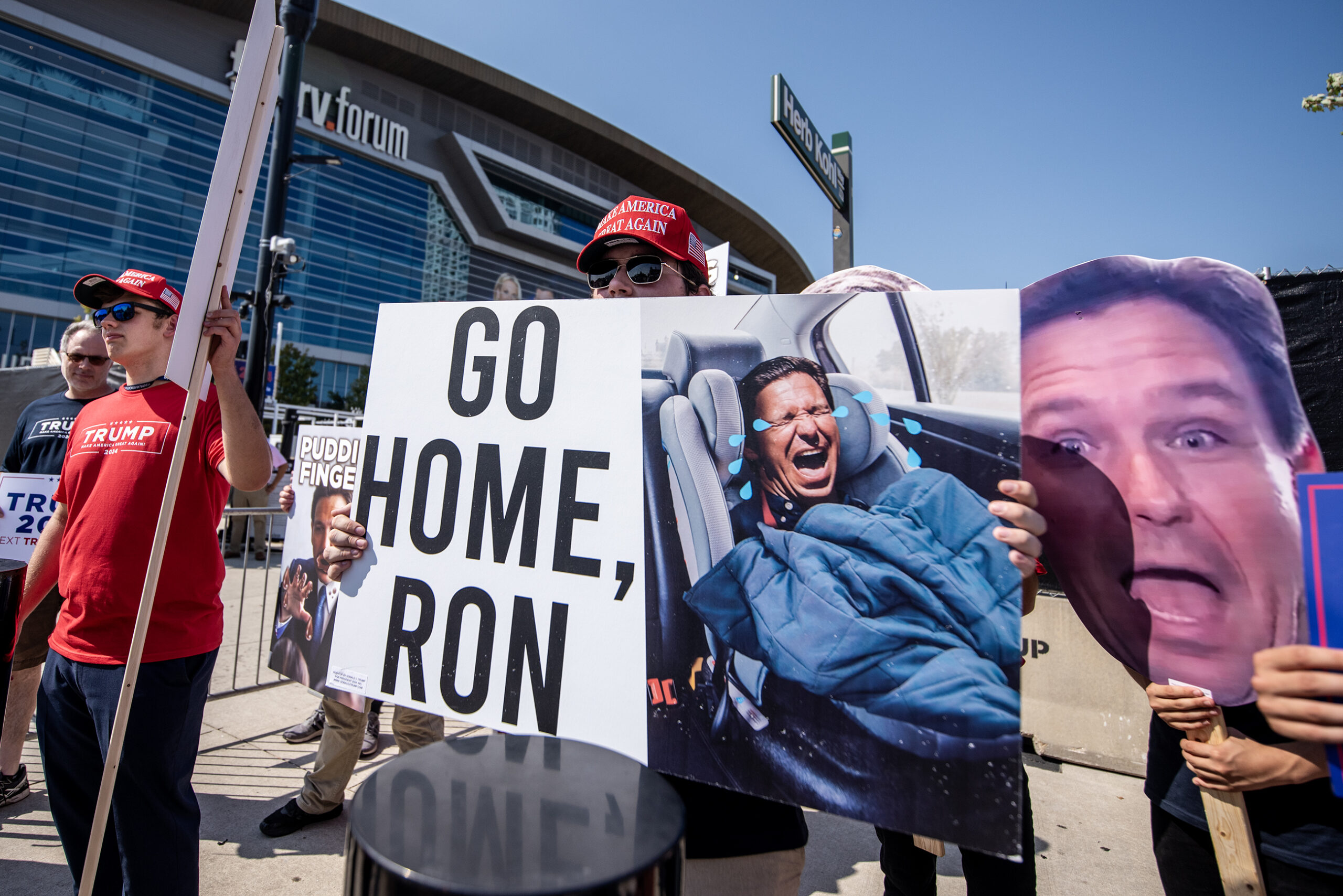 A protester holds a sign that says 