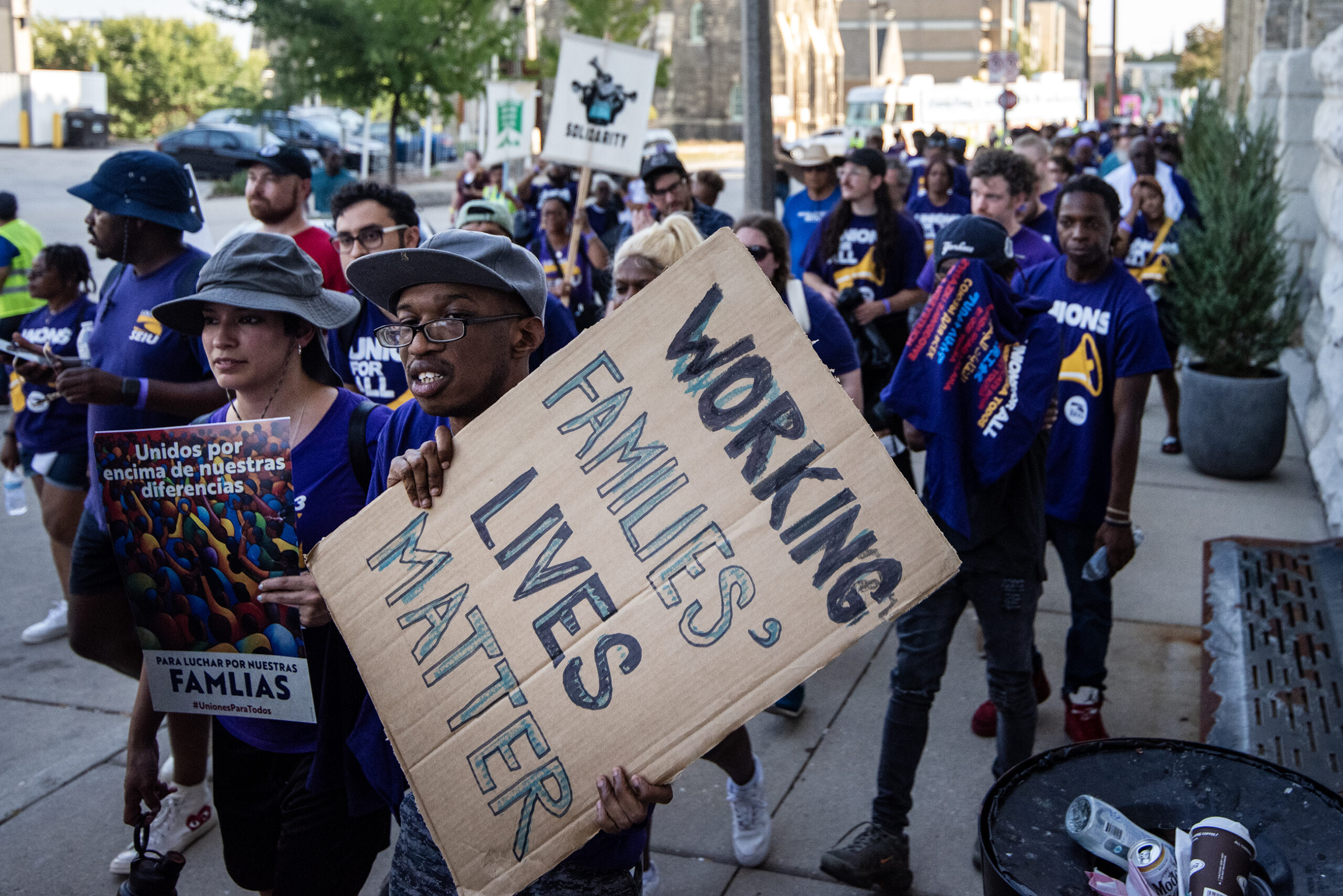 A protester holds a sign that says 