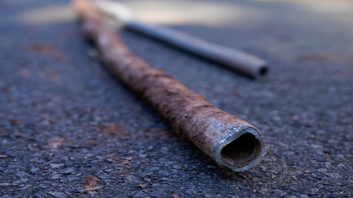 A lead pipe on the ground