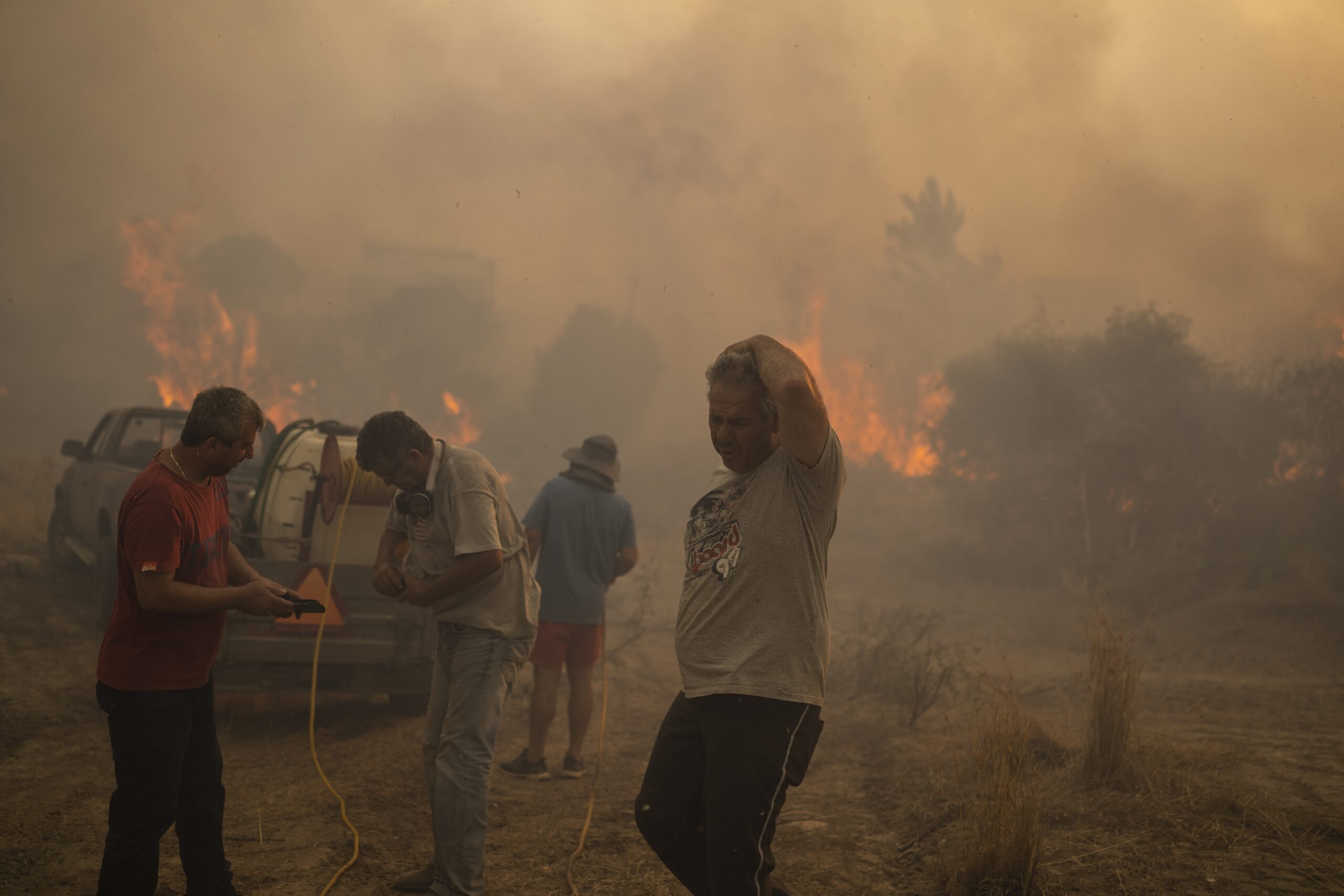 People fighting a wildfire