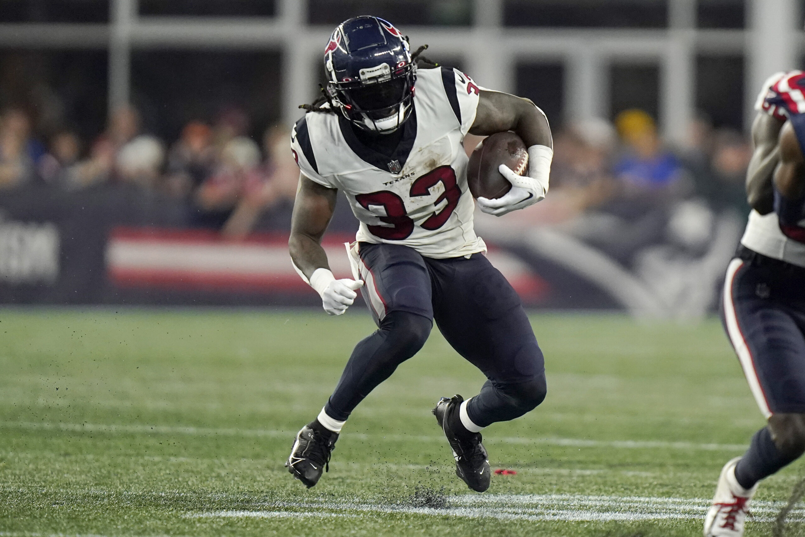 Houston Texans and former Badgers running back runs the ball during a preseason game