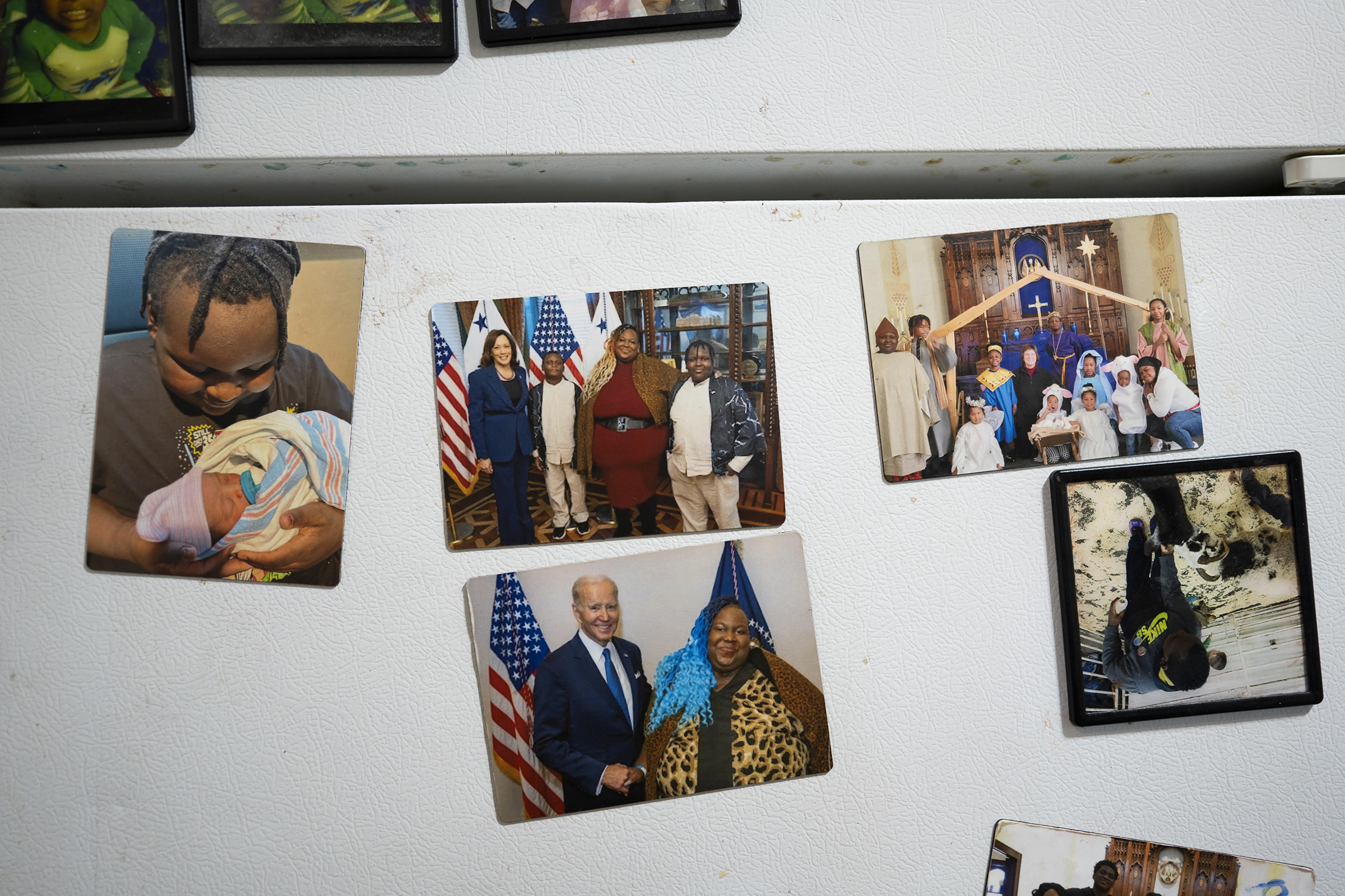 Family photos cover the refrigerator of the Branch family kitchen