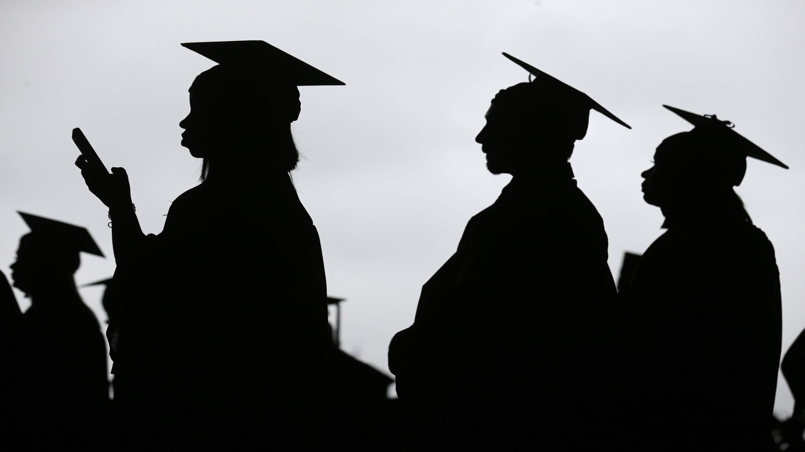 Students in graduation caps and gowns