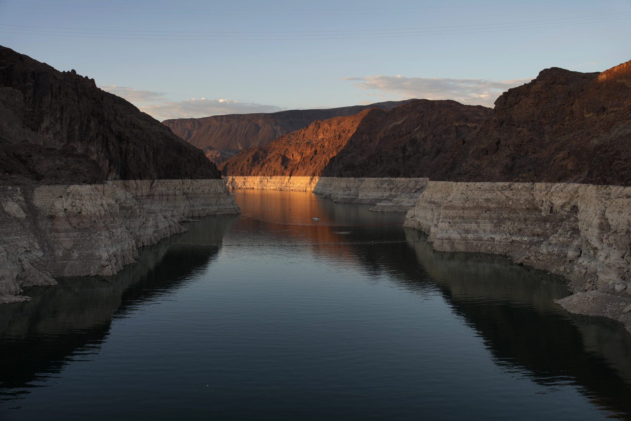 A bathtub ring of light minerals shows the high water line of Lake Mead near Hoover Dam