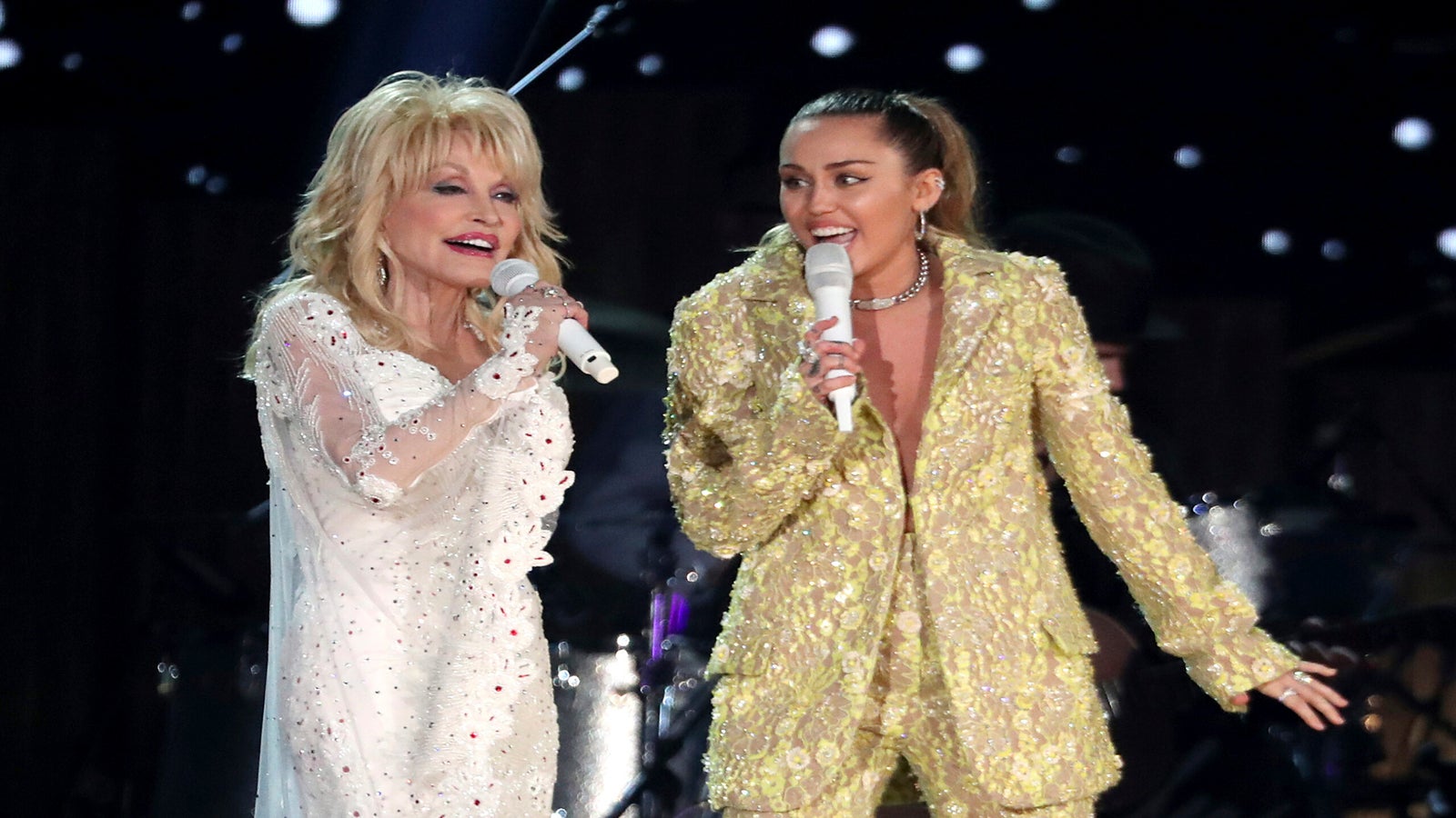 Dolly Parton, left, and Miley Cyrus perform "Jolene" at the 61st annual Grammy Awards in Los Angeles