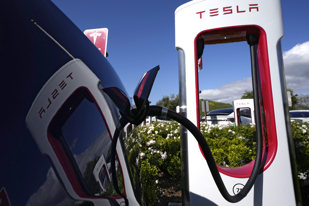 A Tesla car at a charging station in California