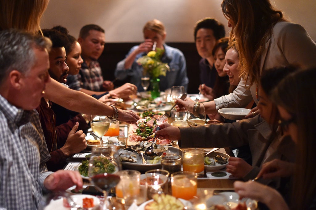 Invited media guests dig in to custom dishes featuring California Olive Ranch extra virgin olive oil on Thursday, March 31, 2016, in Venice, Calif. Jordan Strauss/AP Images