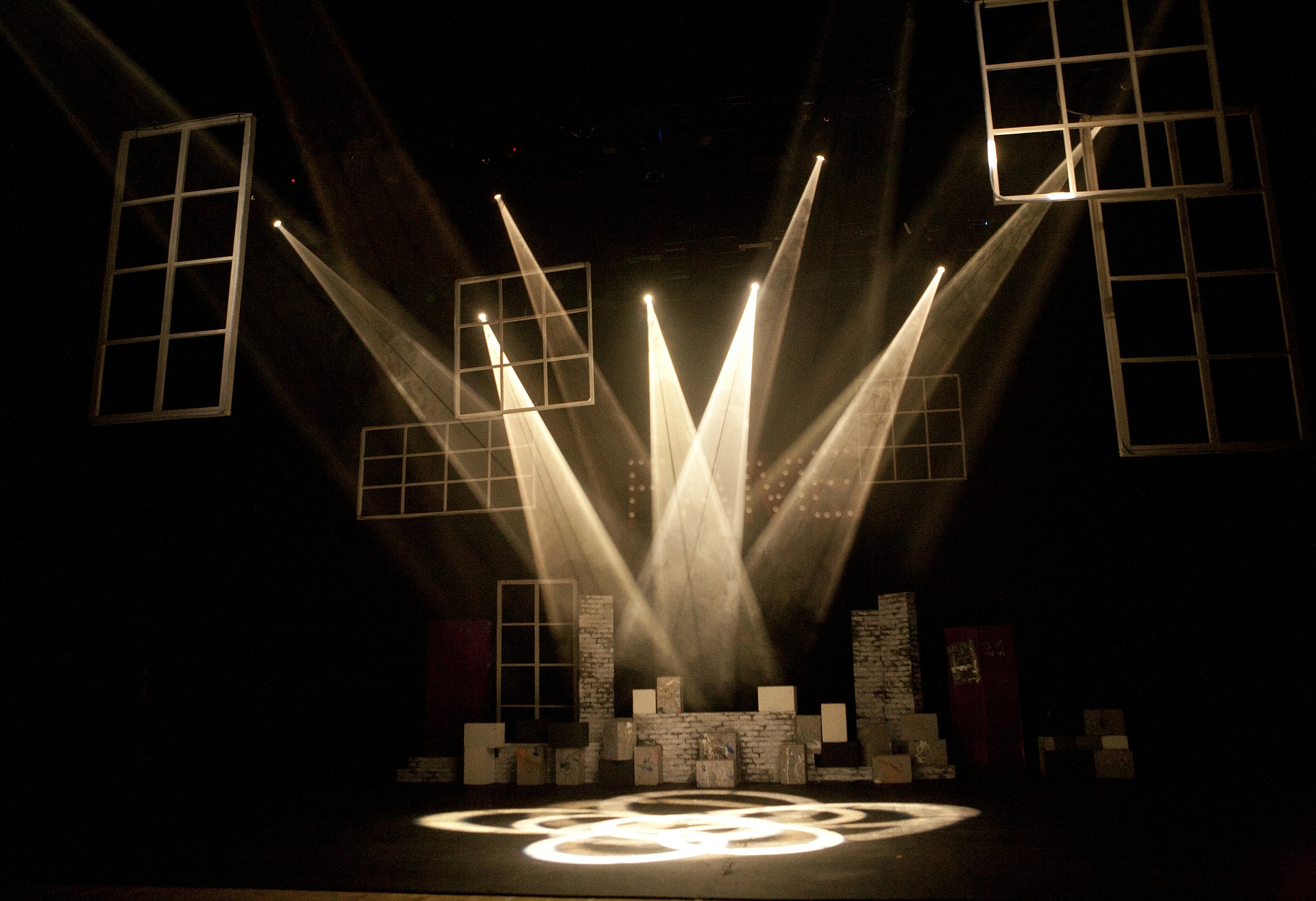 Empty stage with stylized lighting.