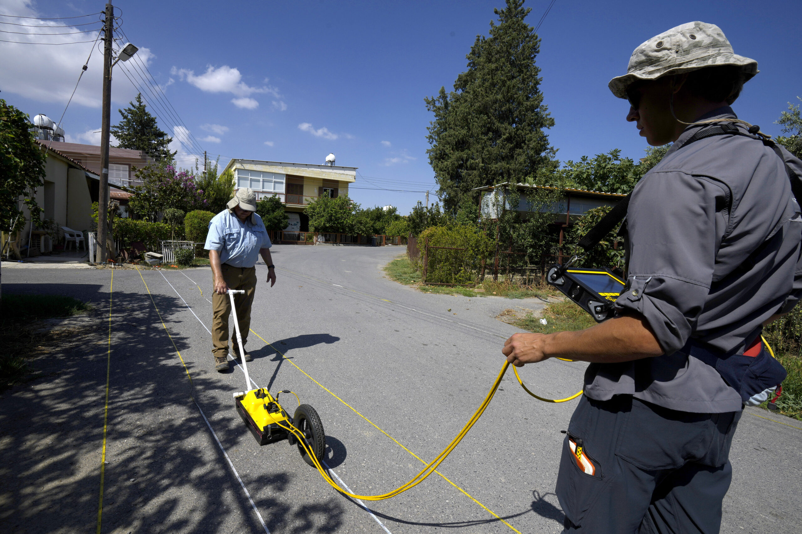 Harry M. Jol, left, a geography and anthropology professor at the University of Wisconsin Eau Claire, operate ground-penetrating radar in Cyprus.