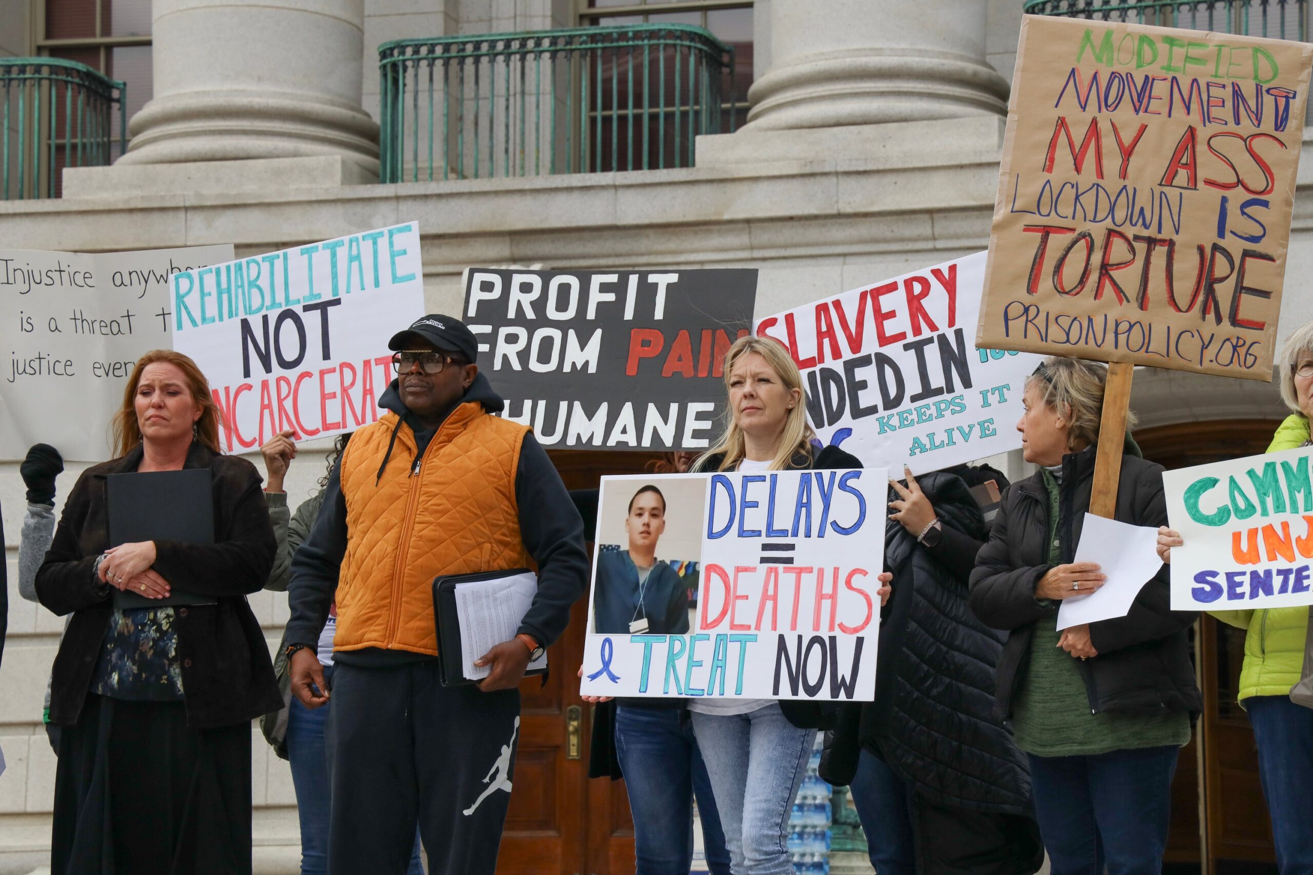 Protesters at the state Capitol calling for prison reform