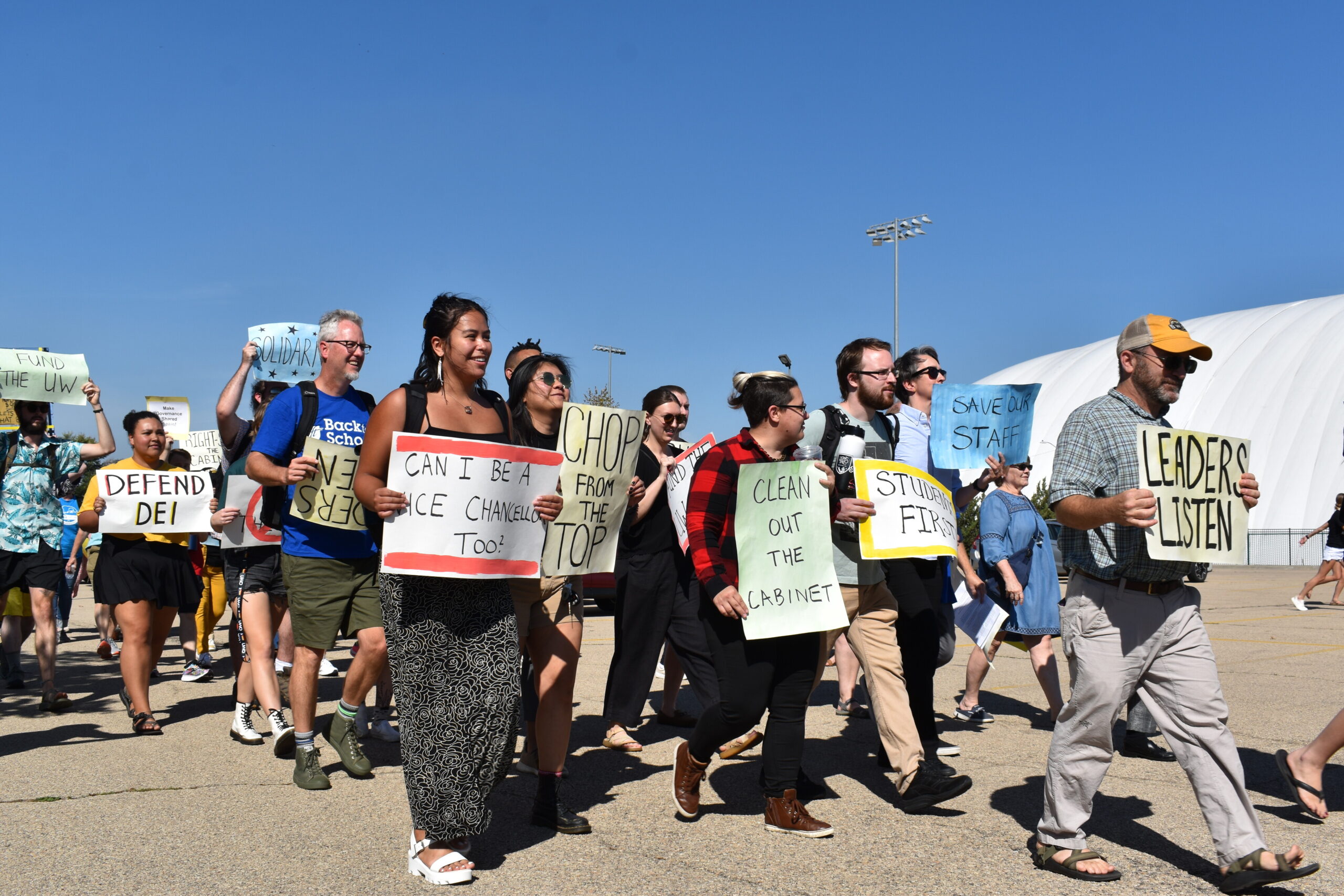 Students, staff, faculty and community members begin their march