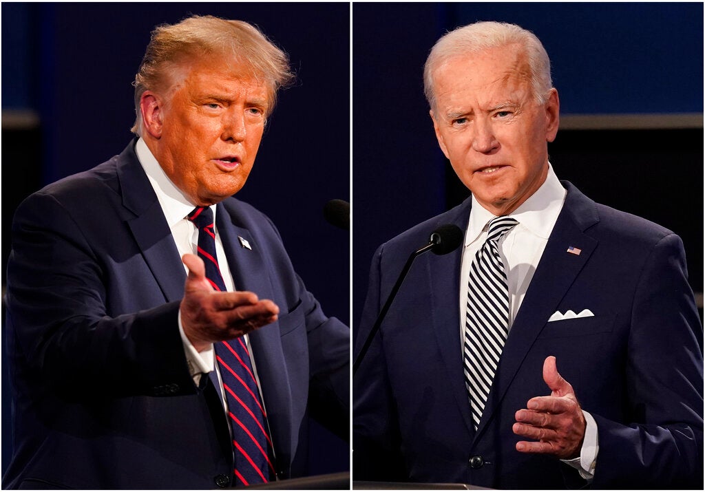 This combination of Sept. 29, 2020, file photos shows former President Donald Trump, left, and President Joe Biden during the first presidential debate at Case Western University and Cleveland Clinic, in Cleveland, Ohio.