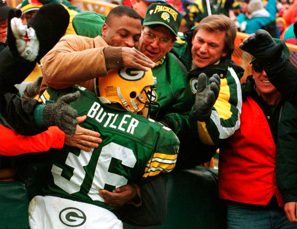 Green Bay Packers' LeRoy Butler jumps into the crowd following an interception late in the fourth quarter of their game against the Chicago Bears in Green Bay, Wisc., on Nov. 12, 1995. After starring for the Seminoles, Butler helped recast the safety posi