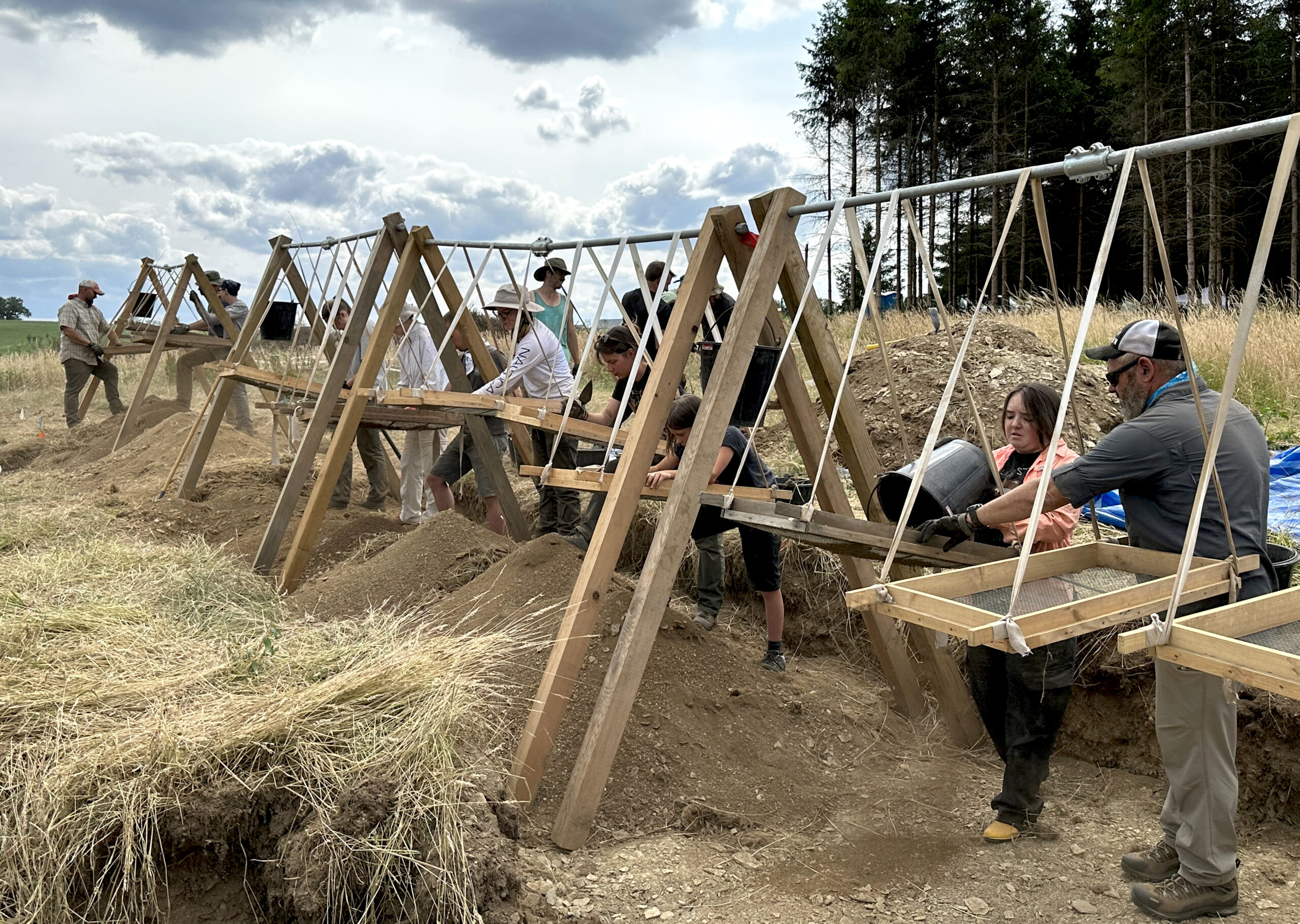 The UW-Madison MIA team works at screening stations in Belgium in the summer of 2023