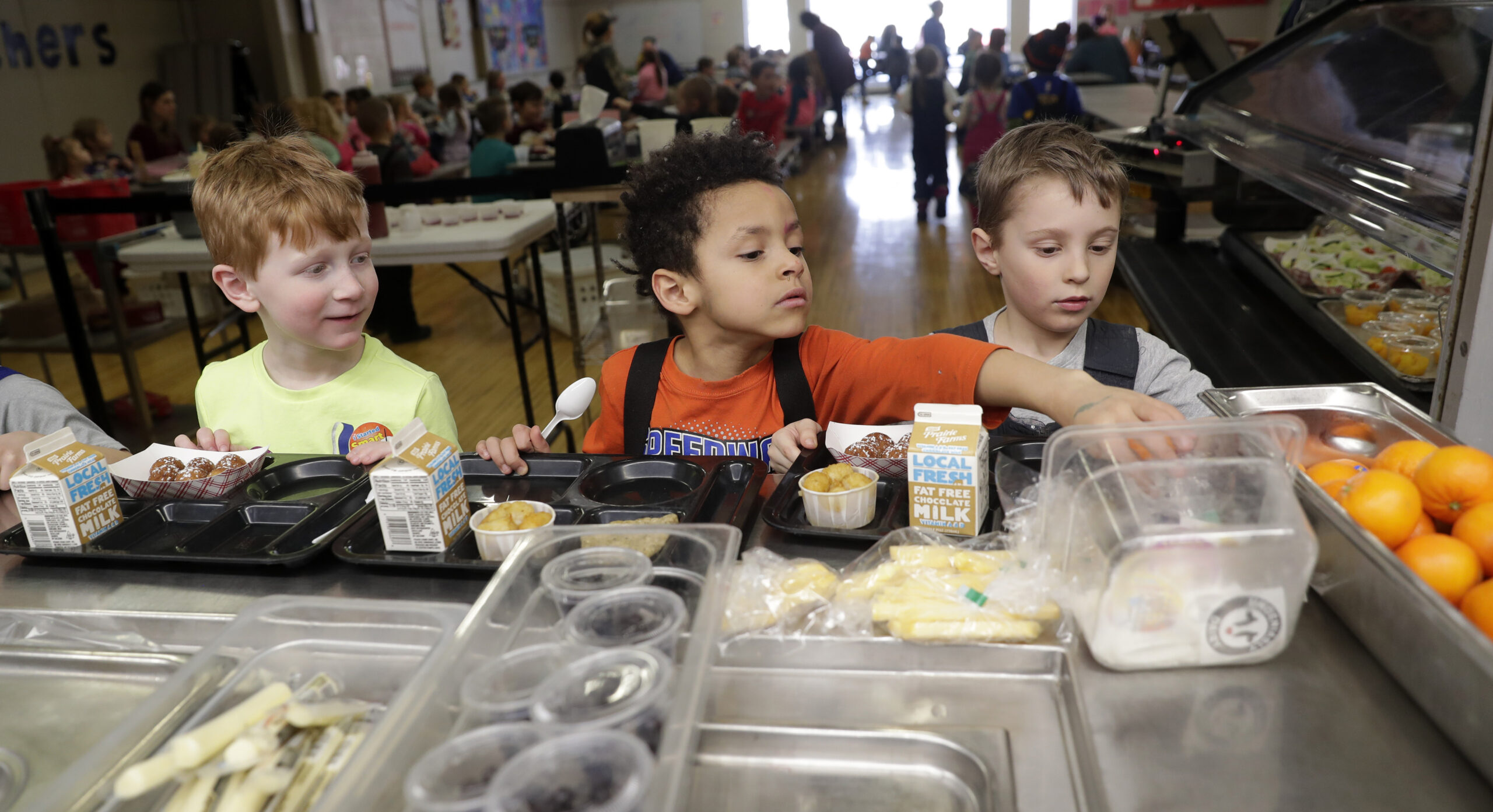 Kindergarten students at Suamico Elementary School go through the hot lunch line