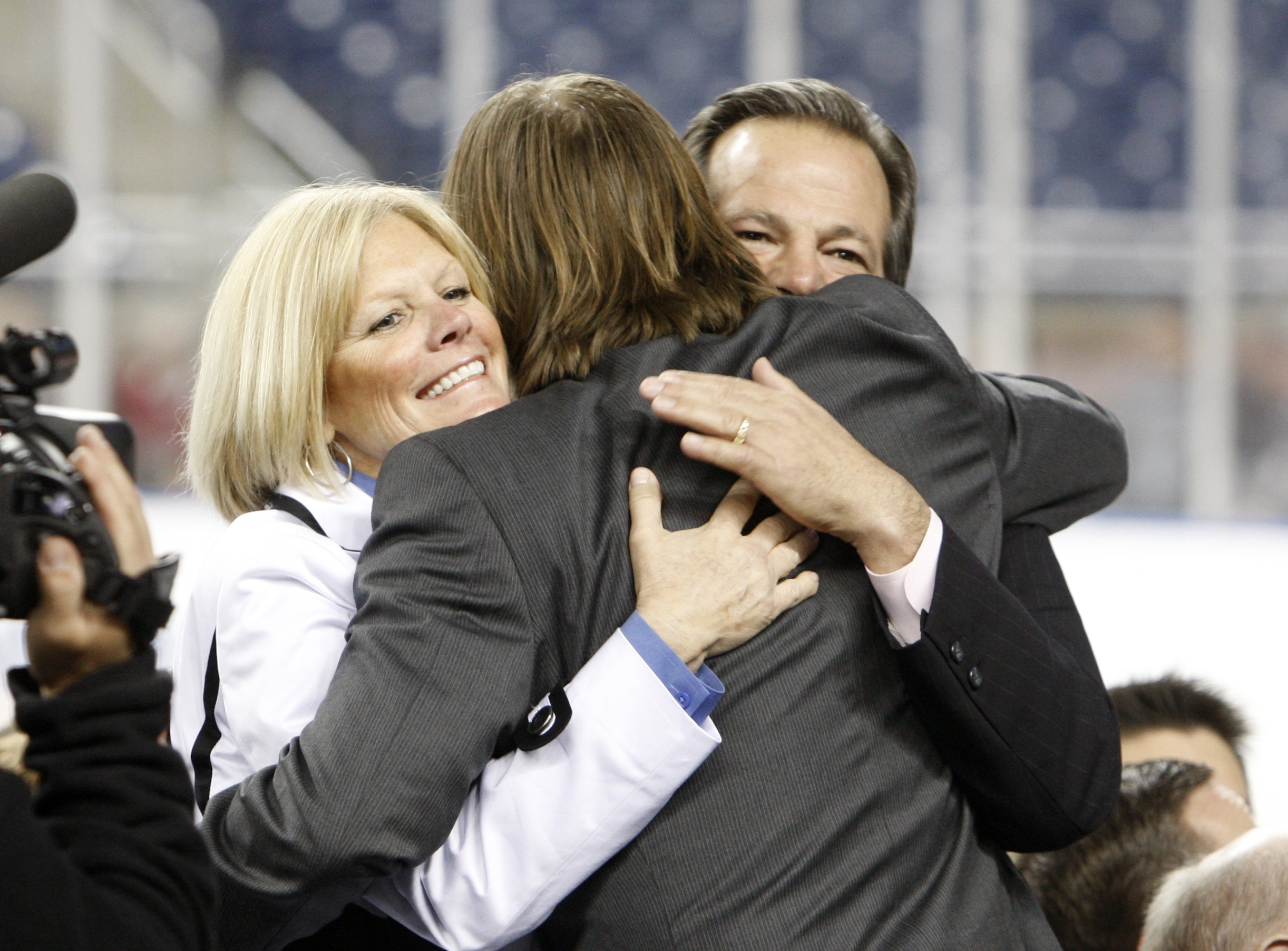 Blake Geoffrion hugs his parents Danny and Kelly after Blake received an award