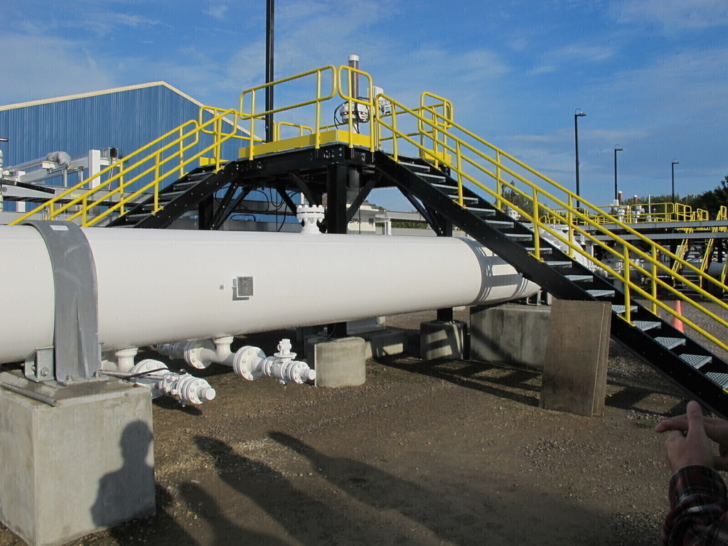 FILE - An above ground section of Enbridge's Line 5 at the Mackinaw City, Mich., pump station sits on Oct. 7, 2016.